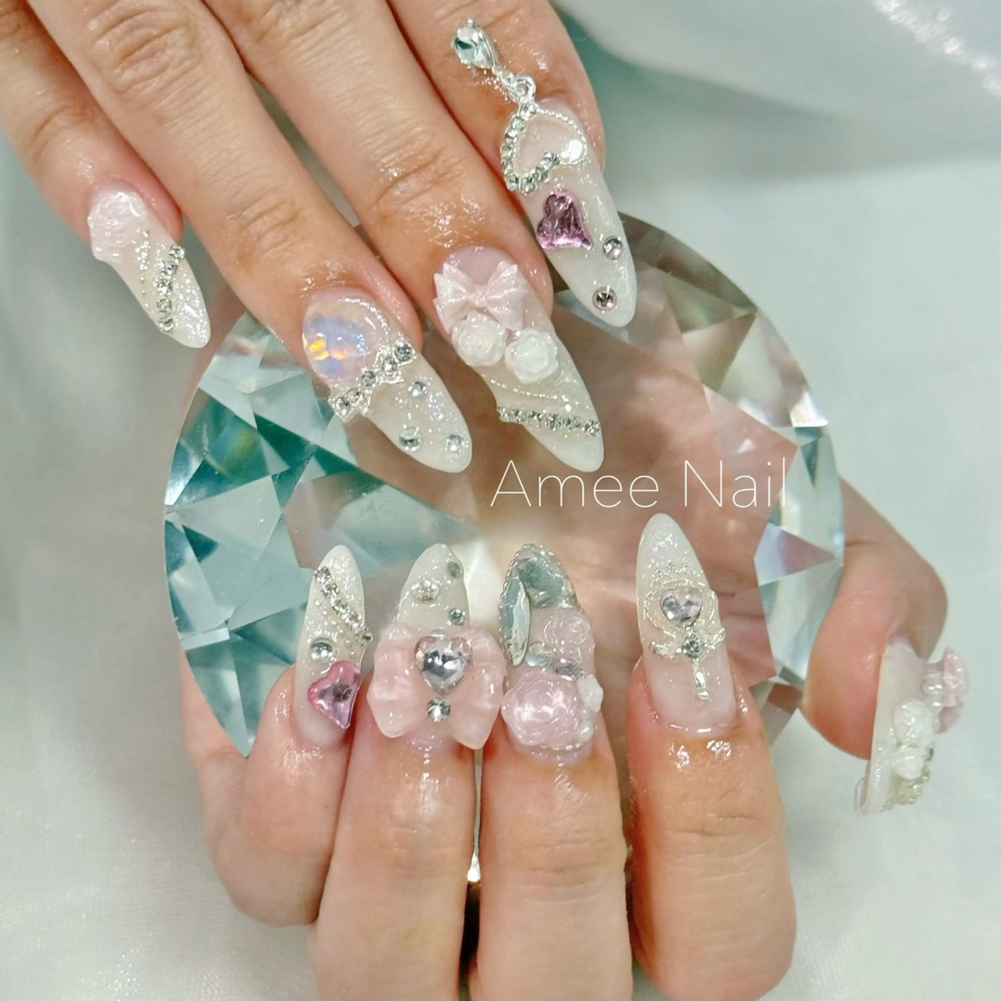 ネイル 成人式 ロングネイル マグネットネイル 大理石ネイル(マーブル) リボン ハンドネイル Amee Nail Salonのネイルデザイン