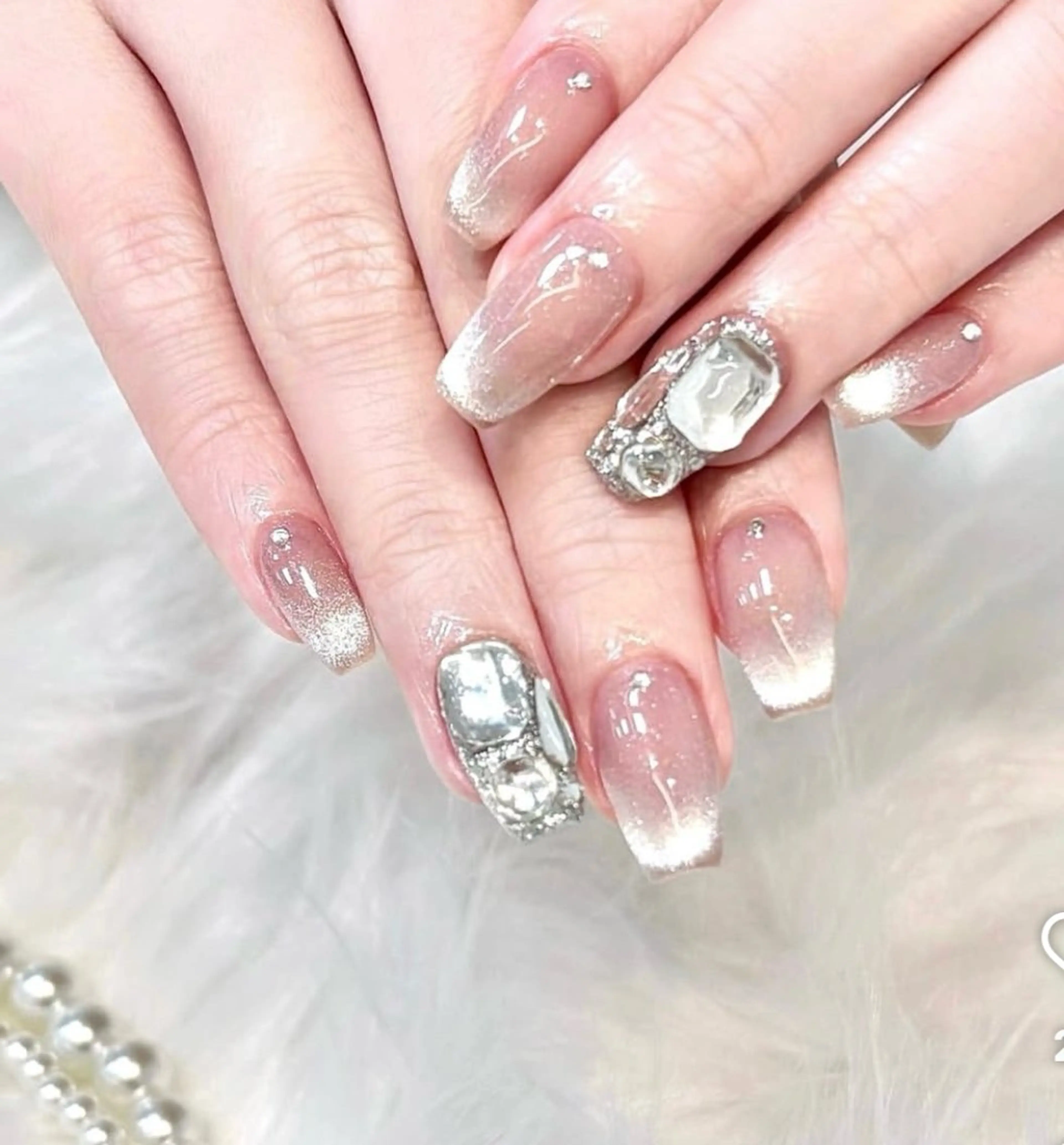 チップ長さ出し10本マグネットワンカラー+2本埋め尽くし🎀の写真