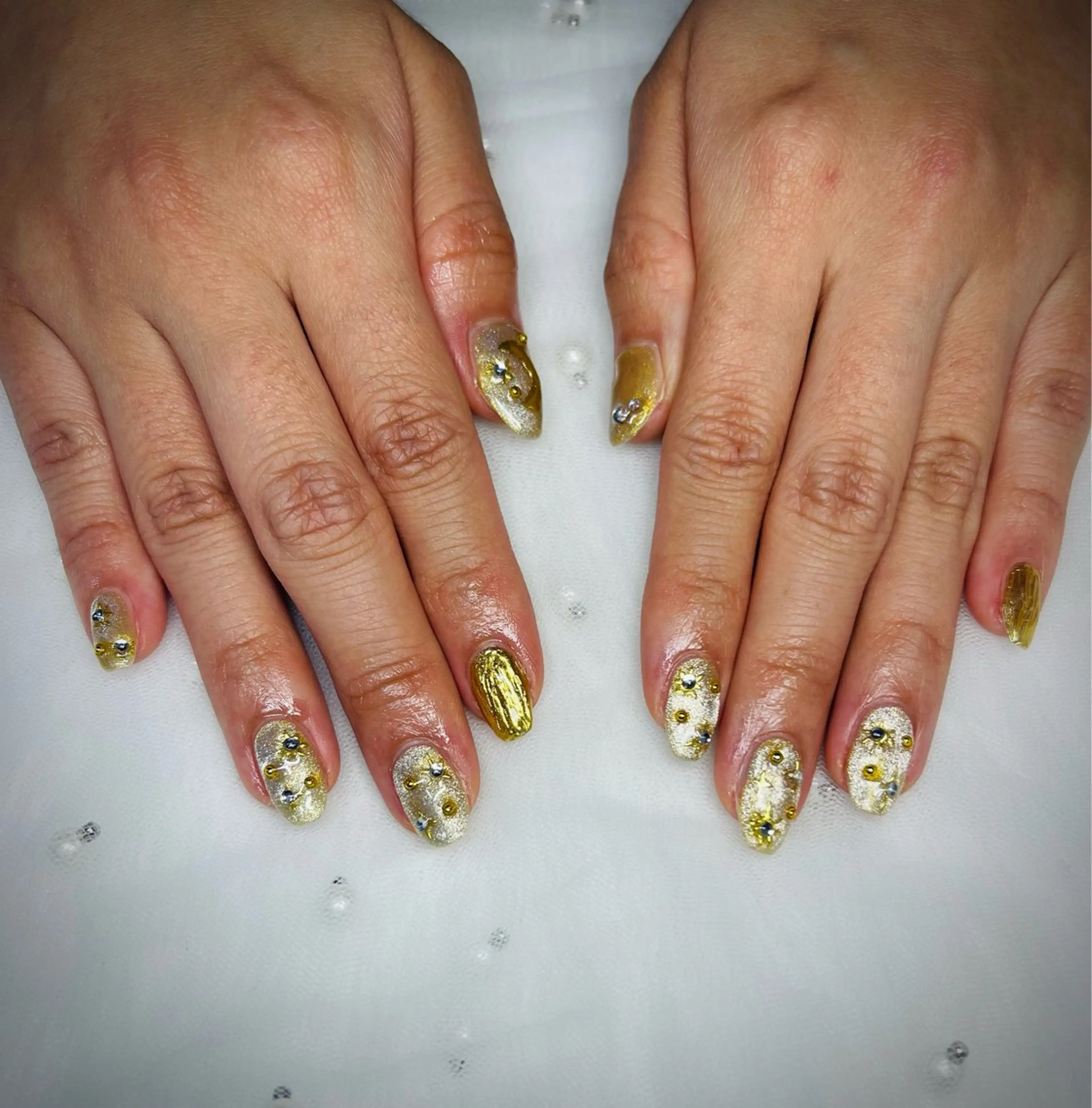 ネイル ゴールド マグネットネイル 冬ネイル クリスマス CREA nailsalonのネイルデザイン