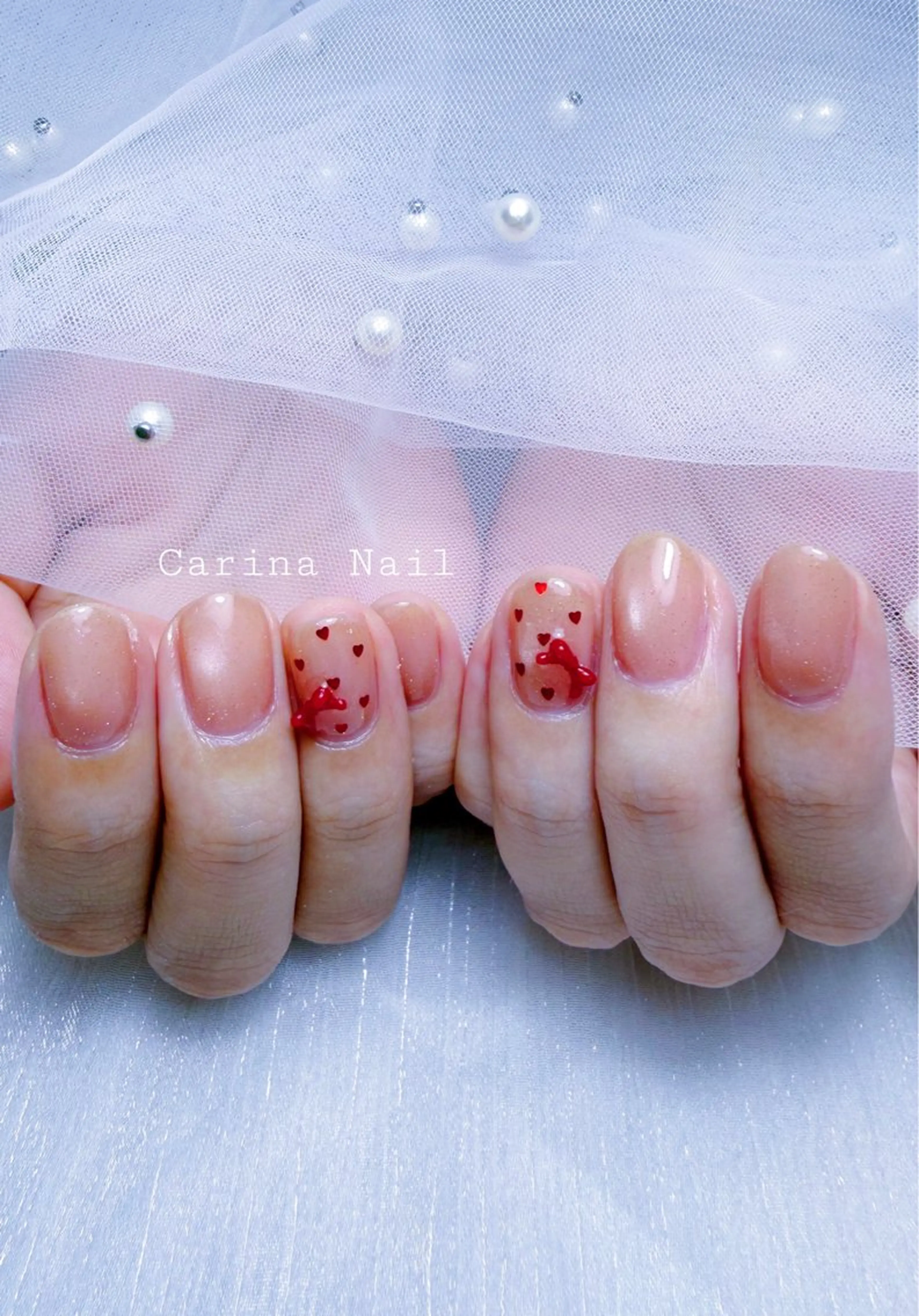 ネイル ガーリー ハート リボン シンプルネイル Carina Nailのネイルデザイン