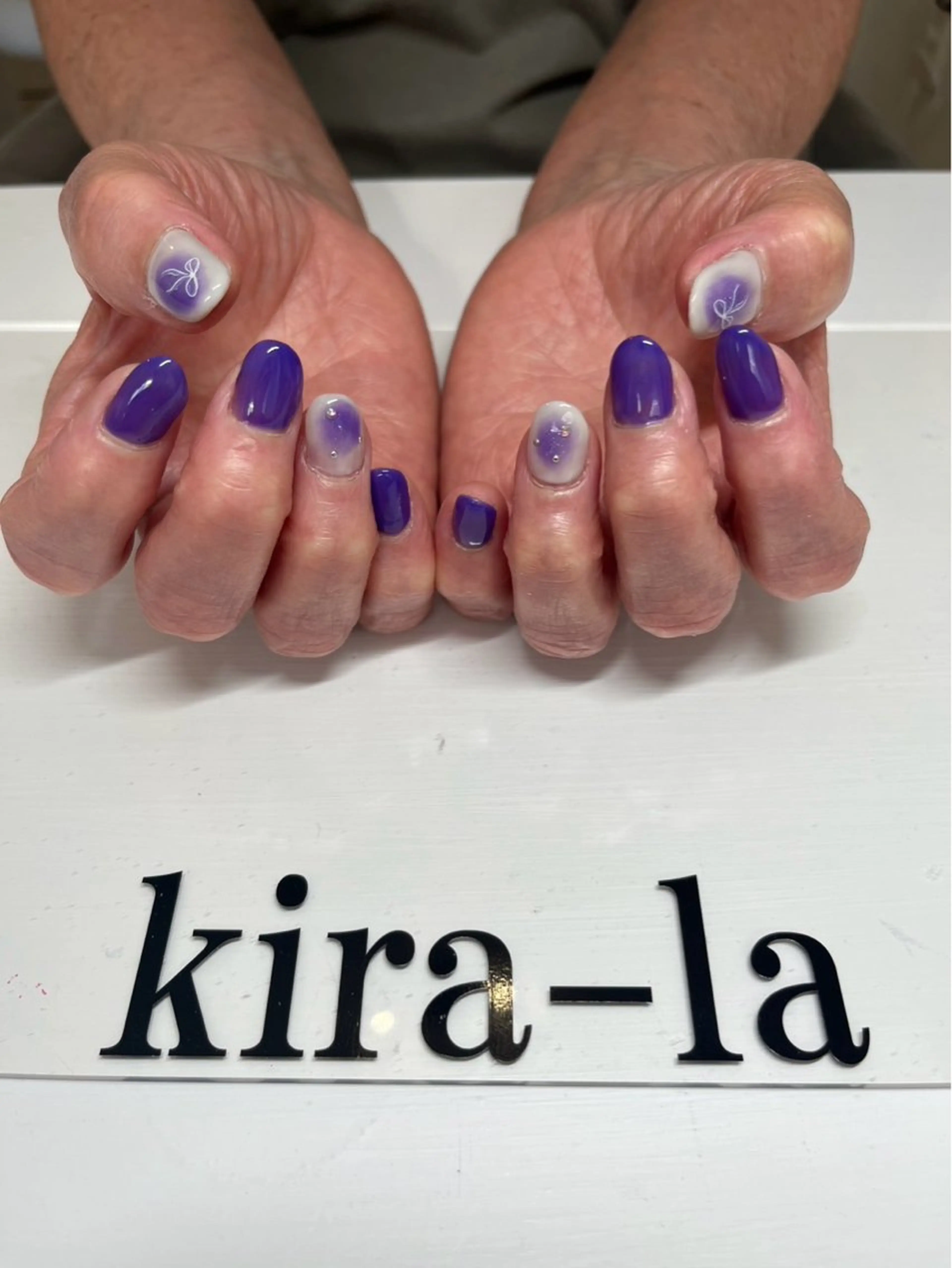 ネイル チークネイル リボン 春ネイル ストーンネイル kira-la キララ･:*..のネイルデザイン