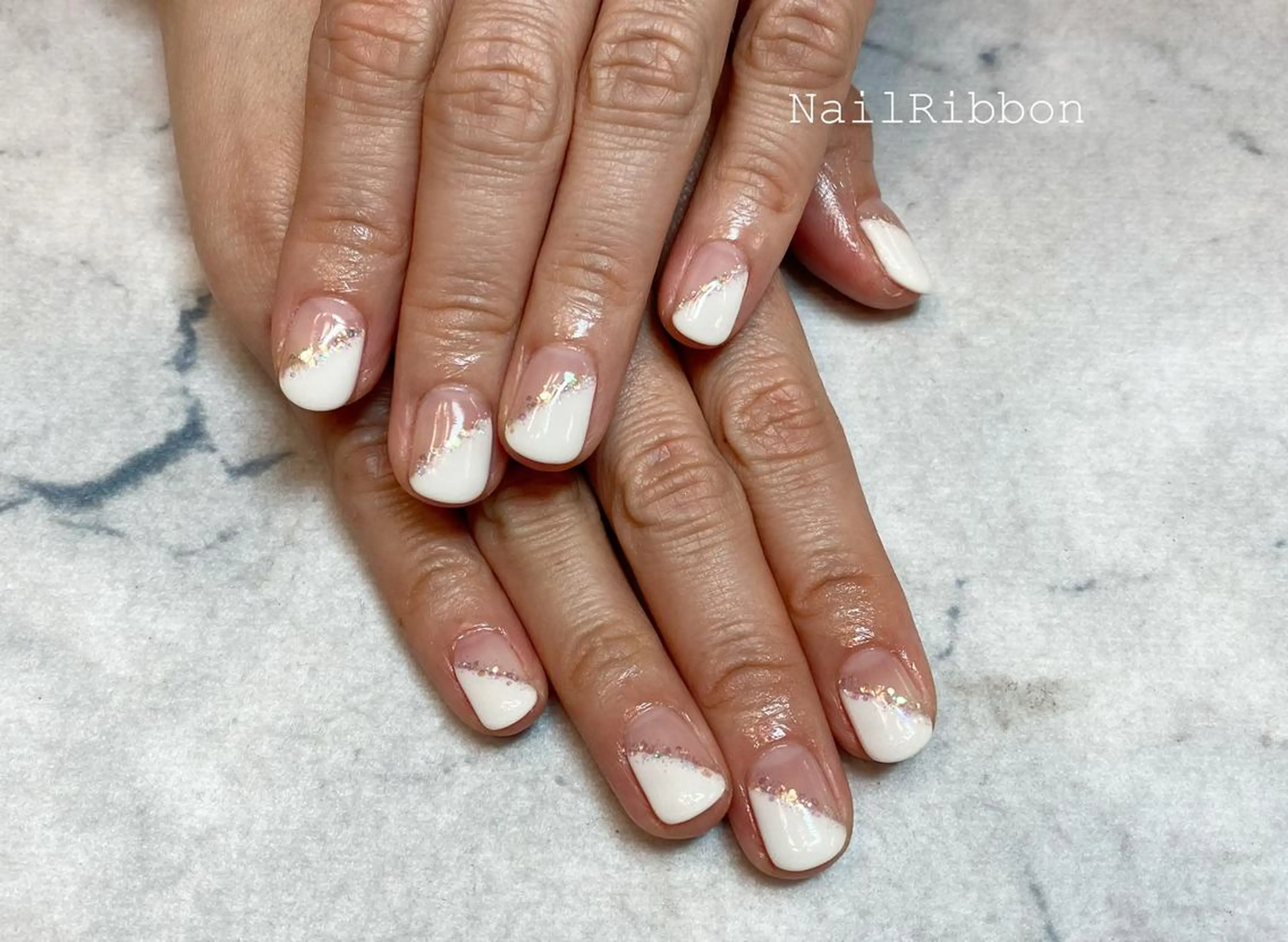 ネイル ネイルリボン 受付スタッフのネイルデザイン