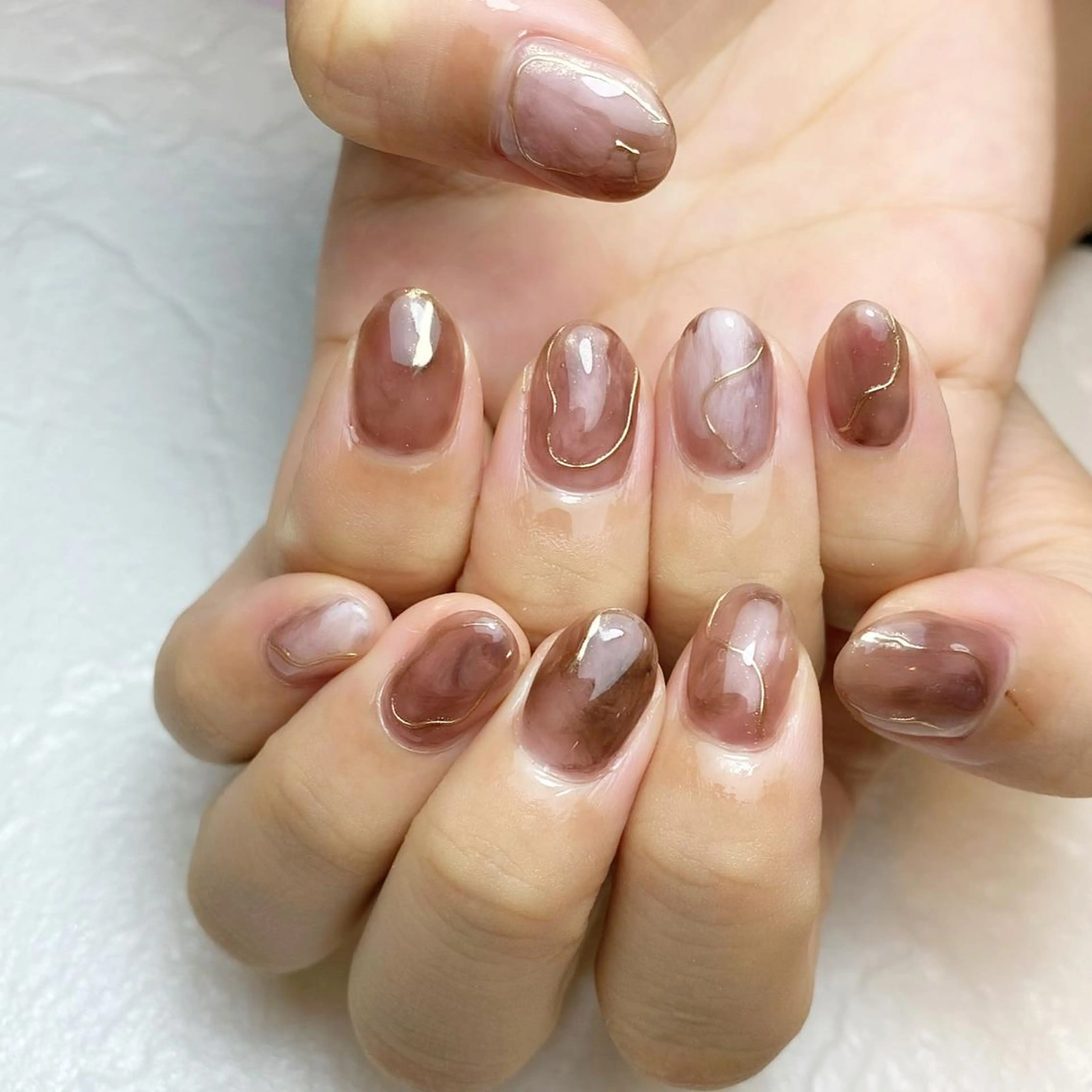 ネイル ブラウン ミラーネイル ニュアンスネイル ハンドネイル Nail ameria megu所属・ameria meguのネイルデザイン