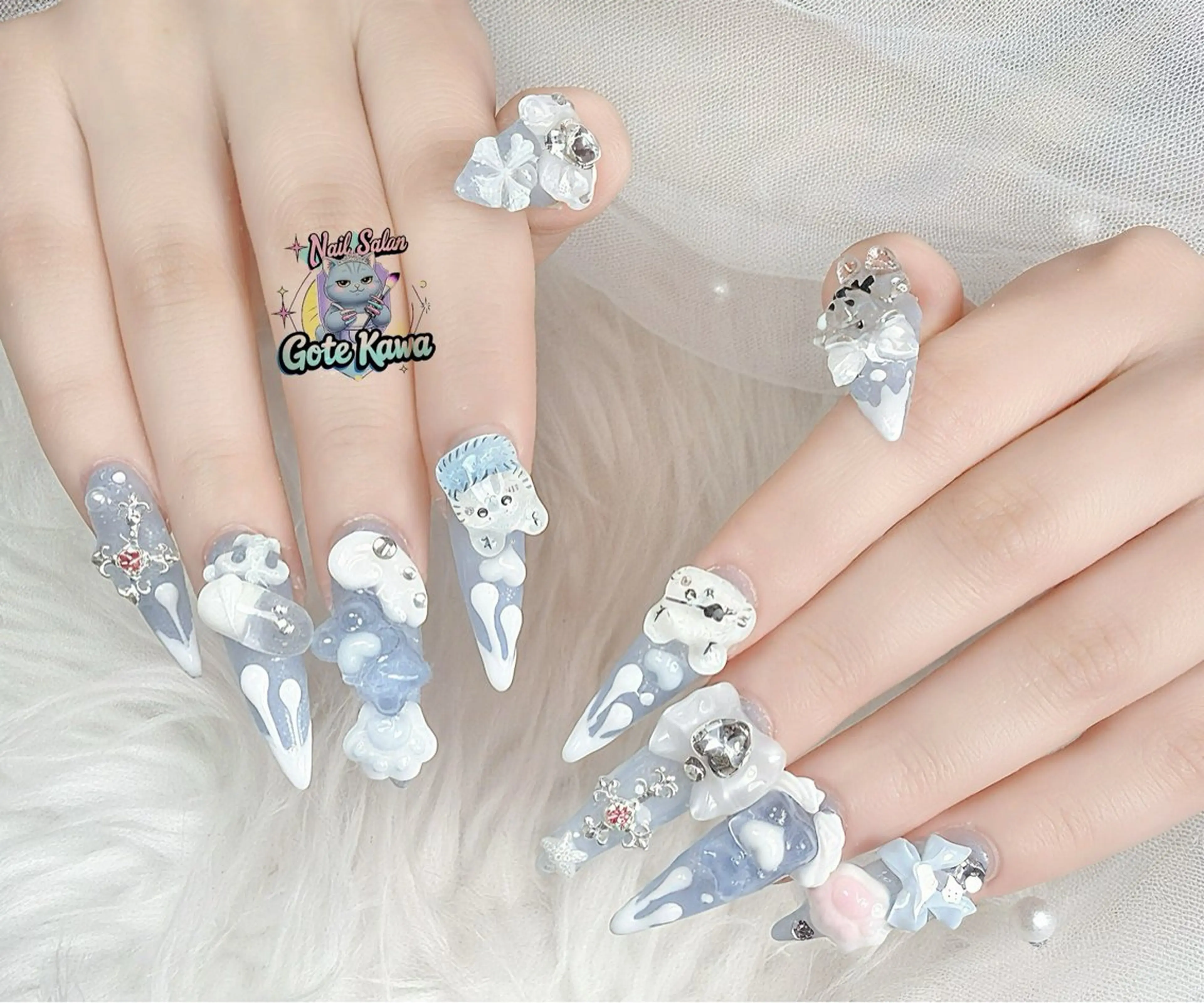 ネイル 水色 リボン ハンドネイル ハンドケア Gote Kawa nail salonのネイルデザイン