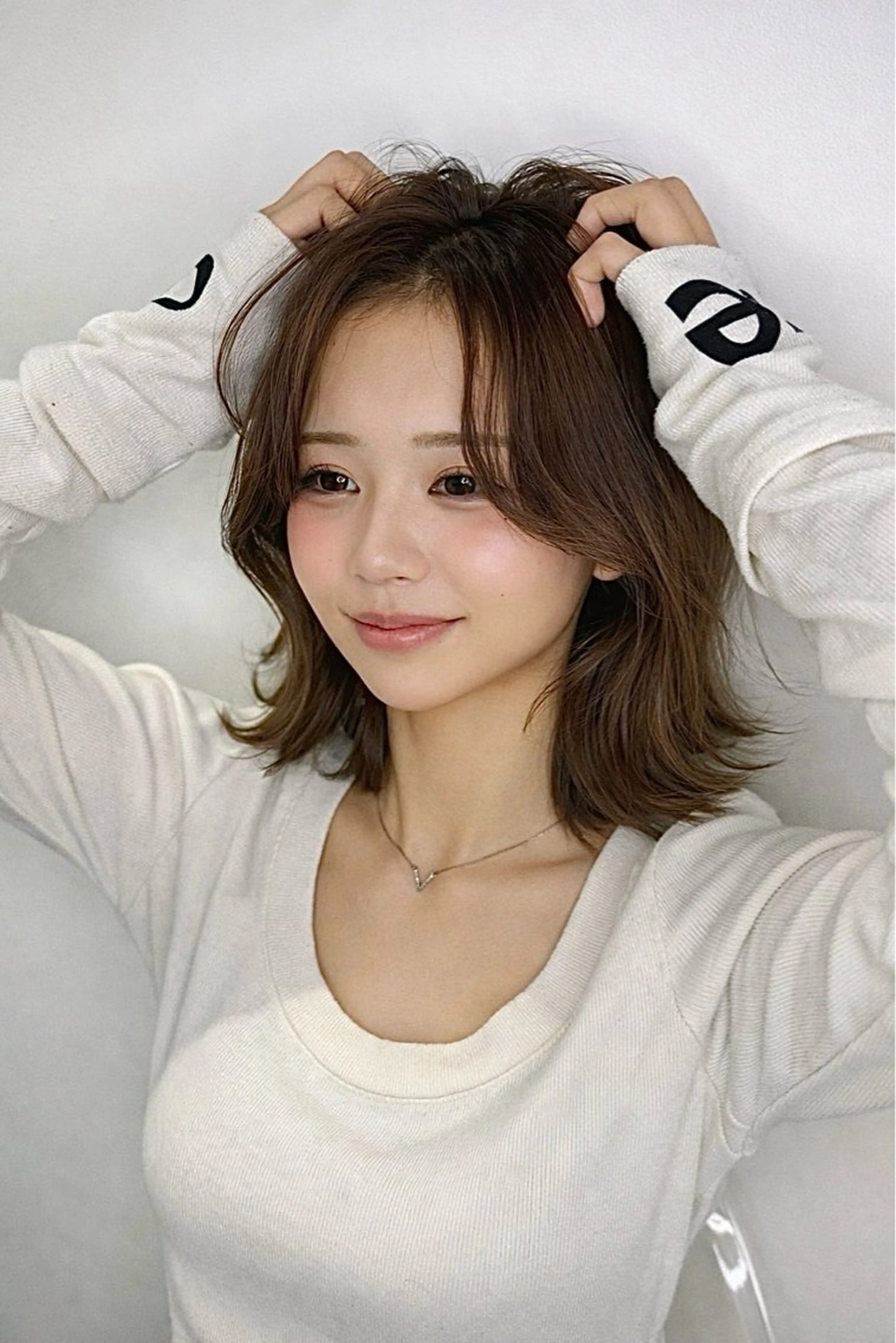 ミディアム マエザワ リュウのヘアスタイル