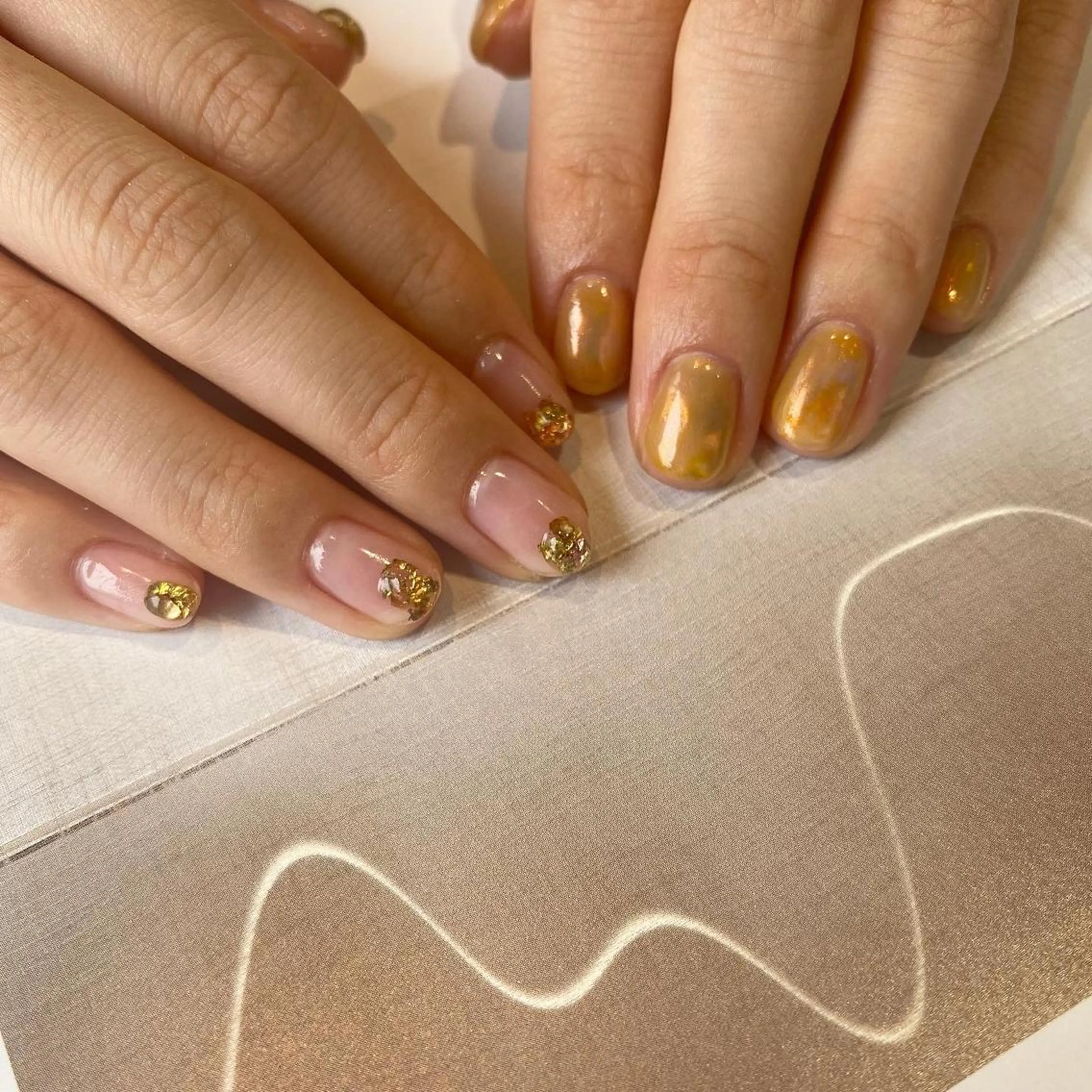 ネイル オーロラネイル オレンジ ハンドネイル nable.所属・栗林 実莉のネイルデザイン