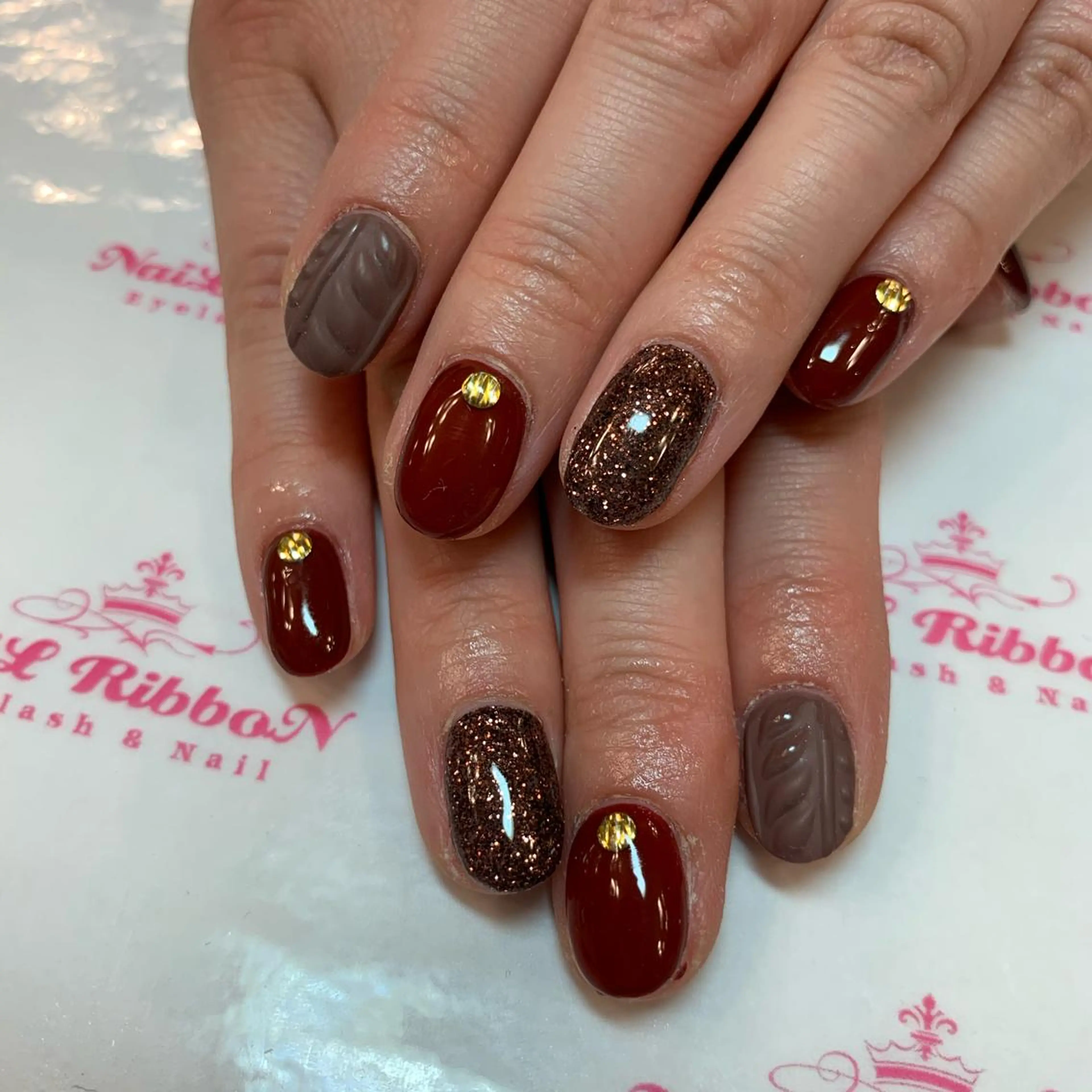 ネイル ネイルリボン 受付スタッフのネイルデザイン