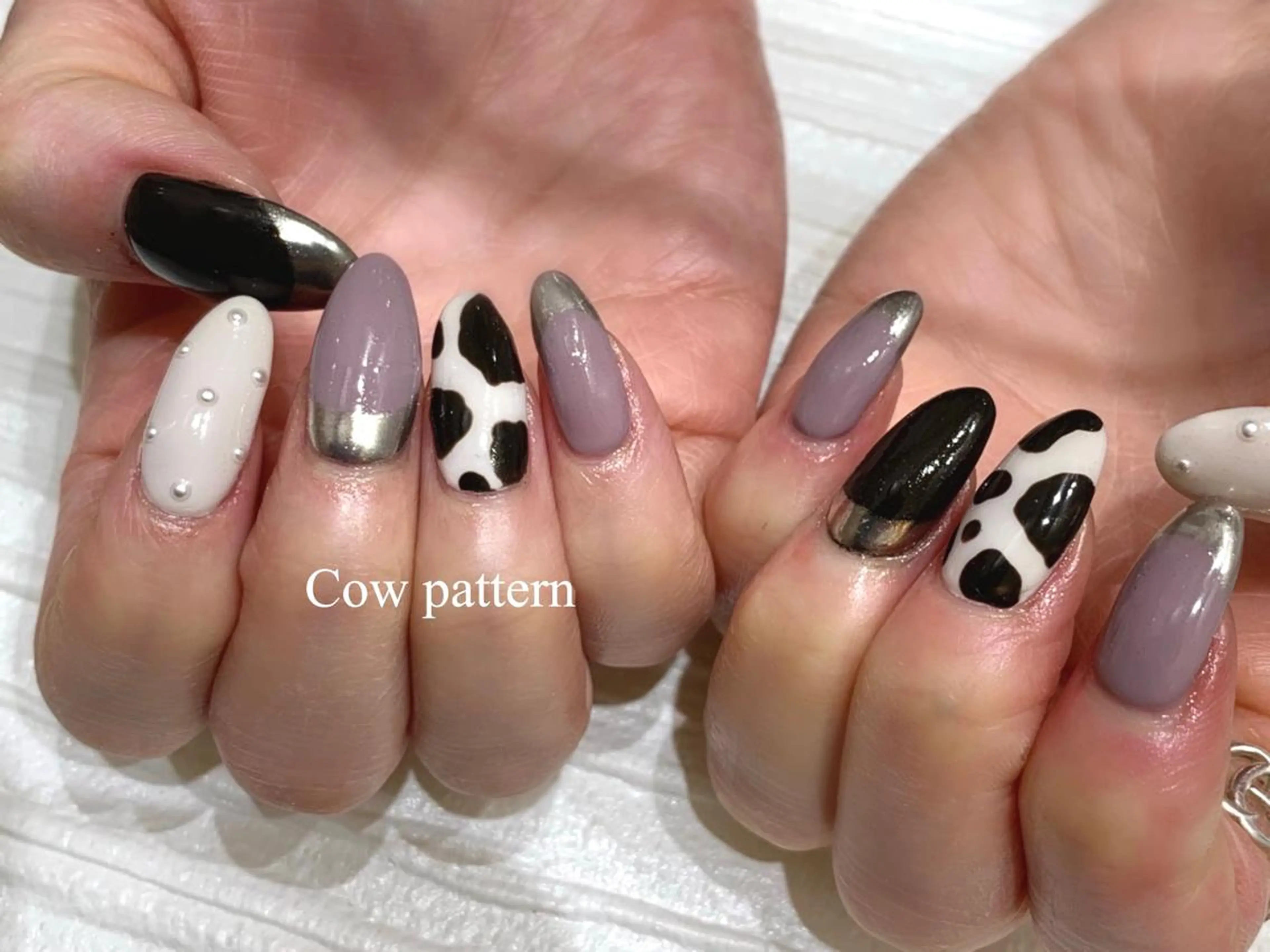 ロング m kaori𓃟のネイルデザイン