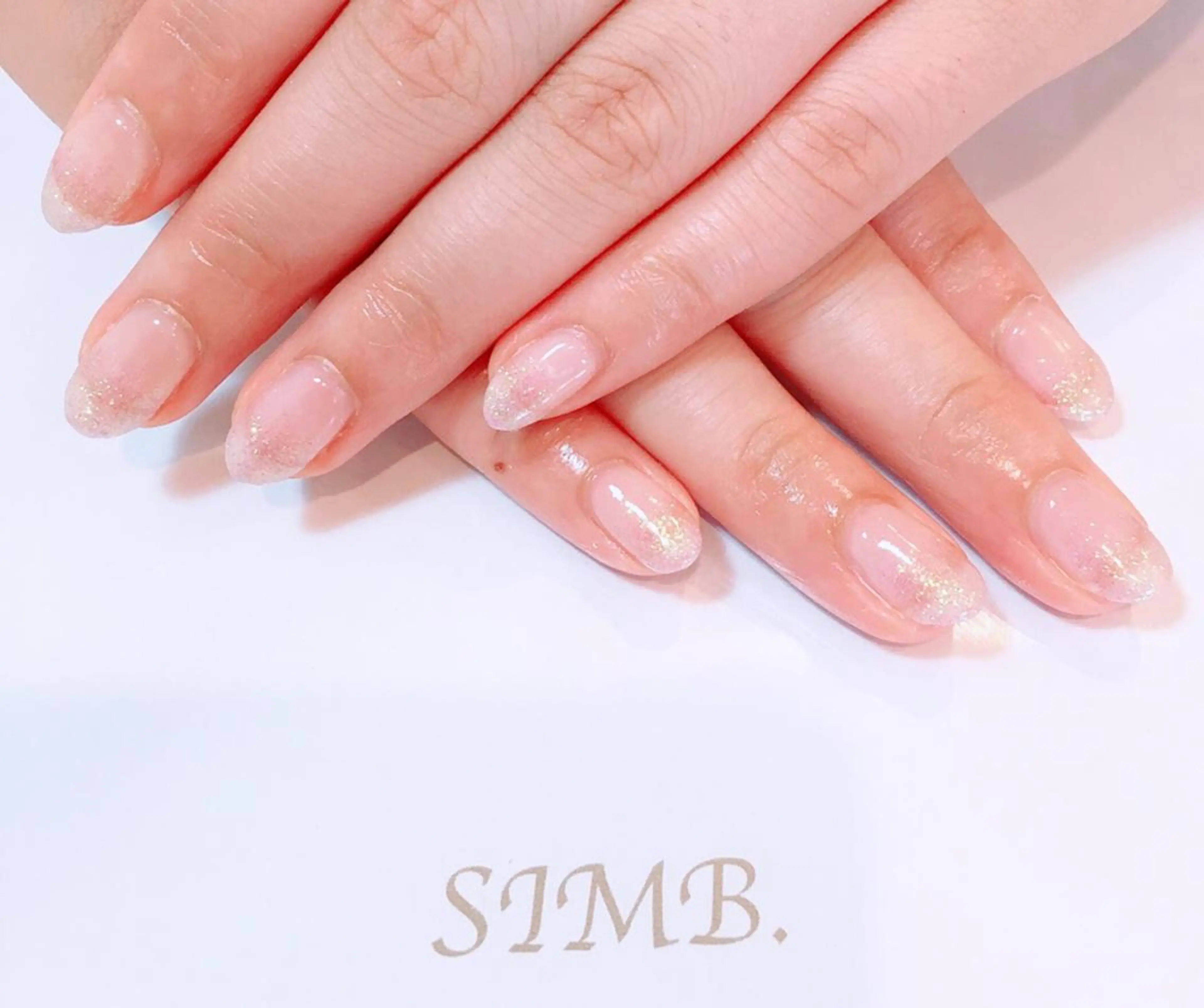 ネイル グラデーション ラメ(グリッター) ラメグラデーション nailsalon SIMB.のネイルデザイン