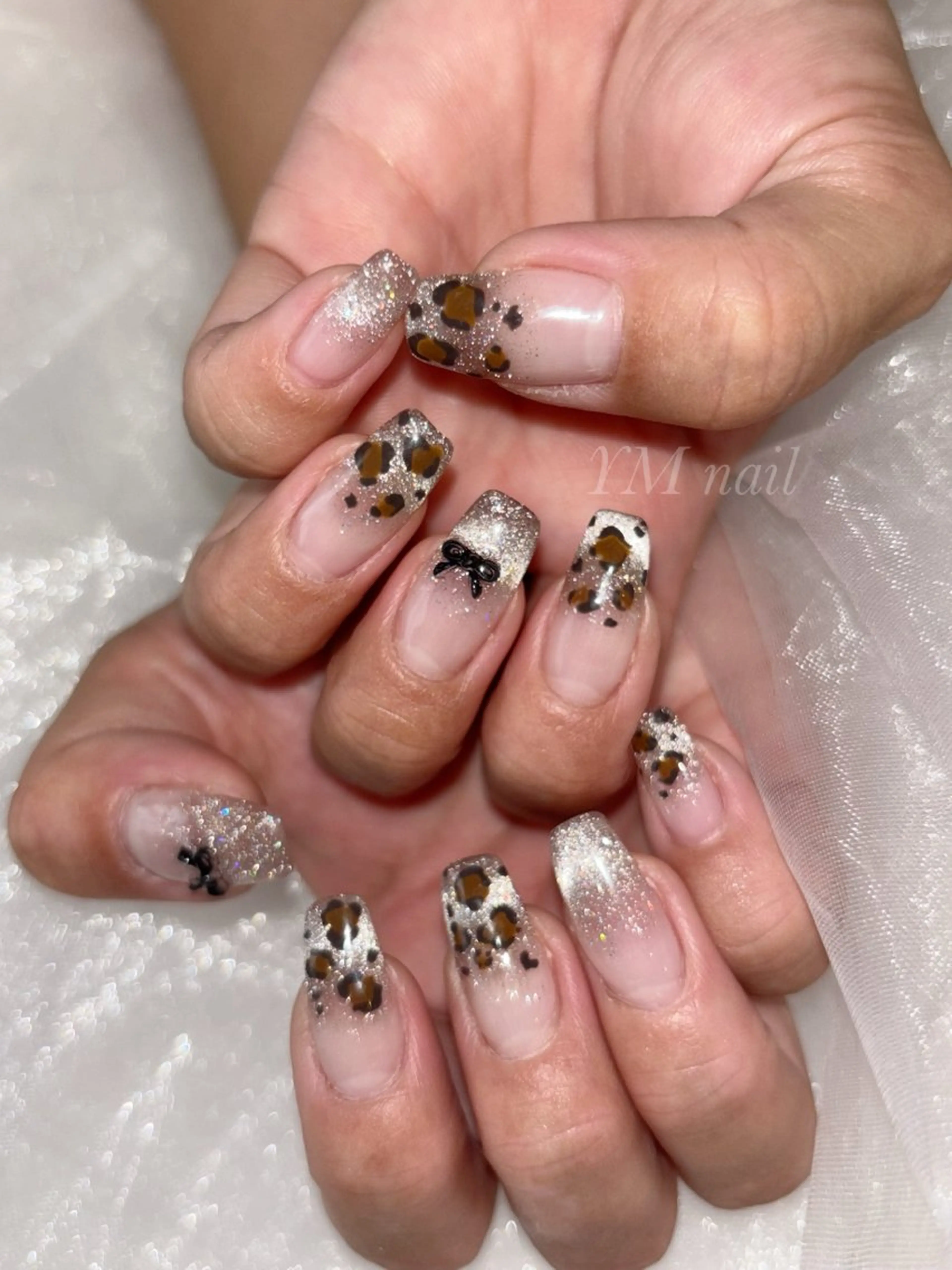ネイル アニマル柄 フラッシュネイル ジェルネイル マグネットネイル リボン YM nailのネイルデザイン