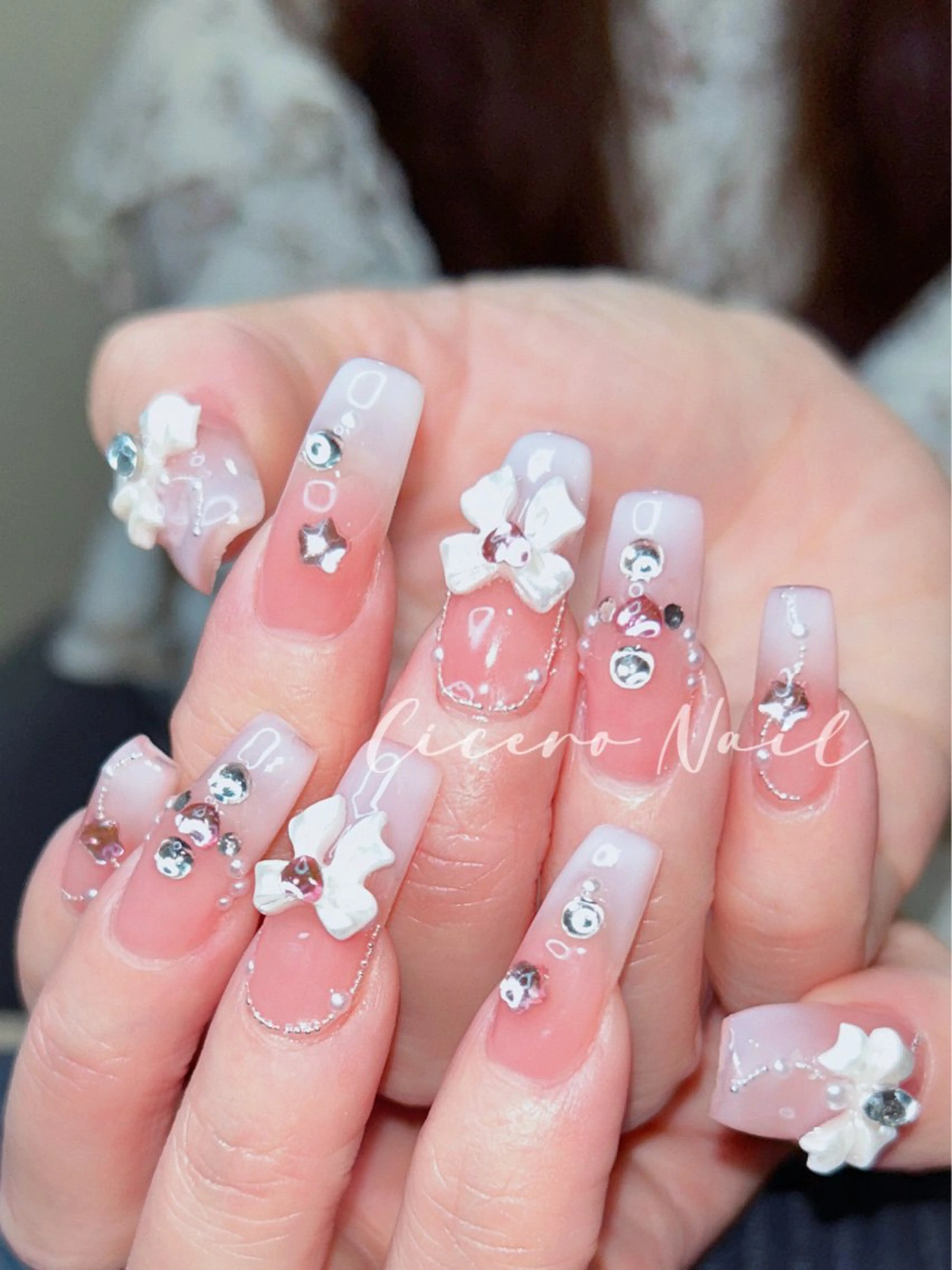 ネイル キラキラネイル ピンク リボン ハンドネイル Cicero Nailのネイルデザイン