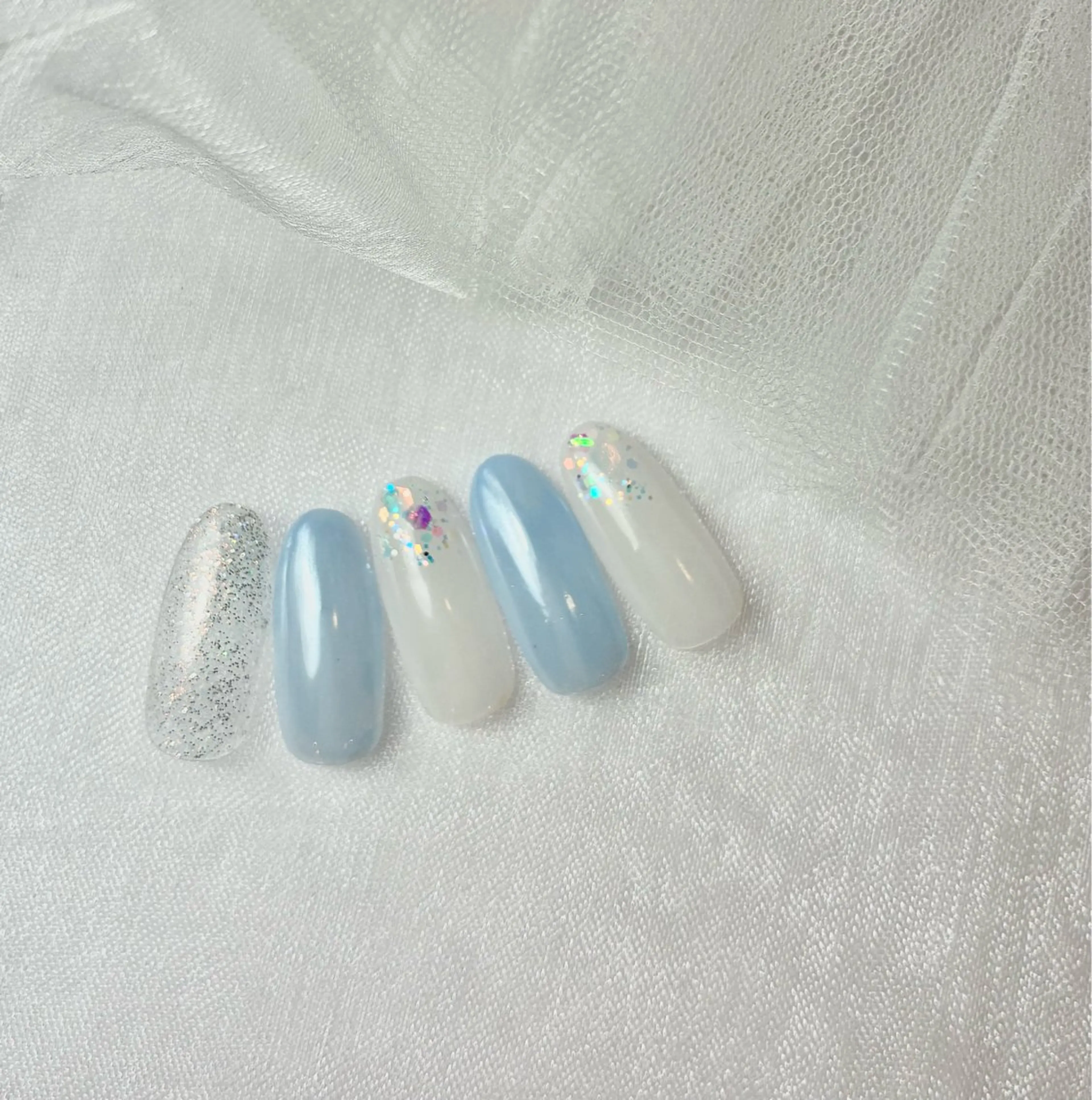 ネイル ブルー ジェルネイル 氷ネイル・うるうるネイル ラメ(グリッター) ハンドネイル addition スタッフReikoのネイルデザイン