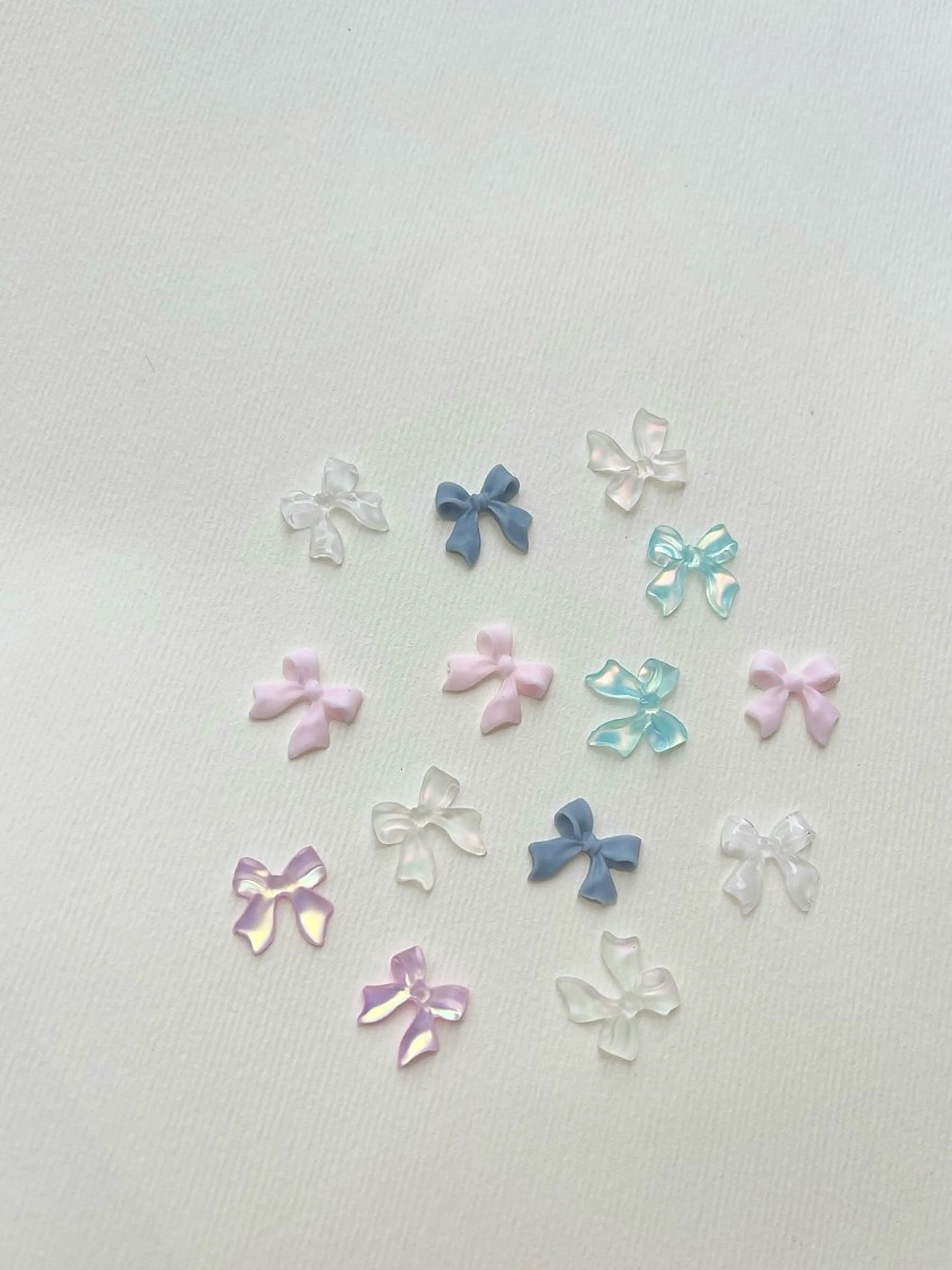 ネイル リボン NORAmanaka /渋谷⟡.·*.のネイルデザイン