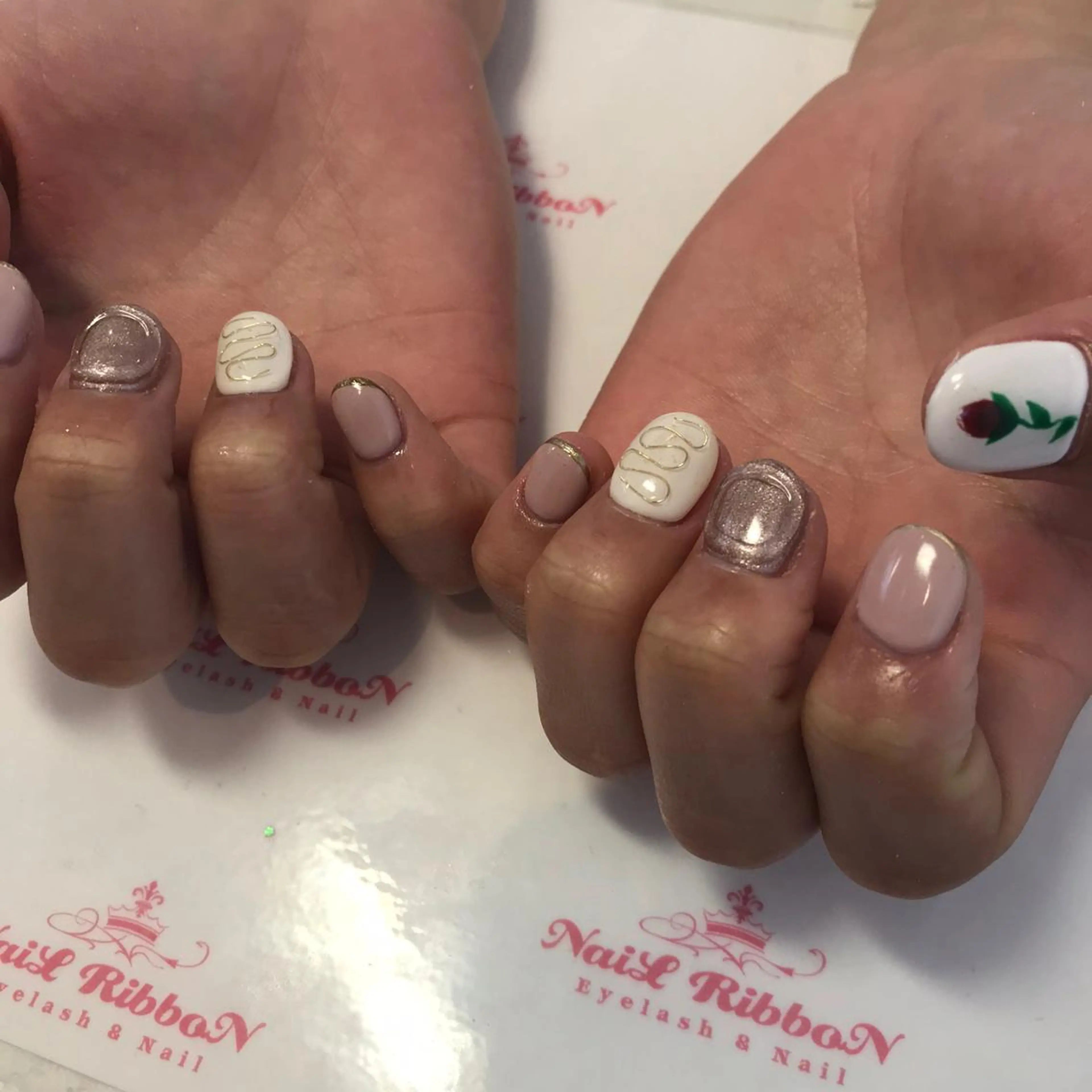 ネイル ネイルリボン 受付スタッフのネイルデザイン