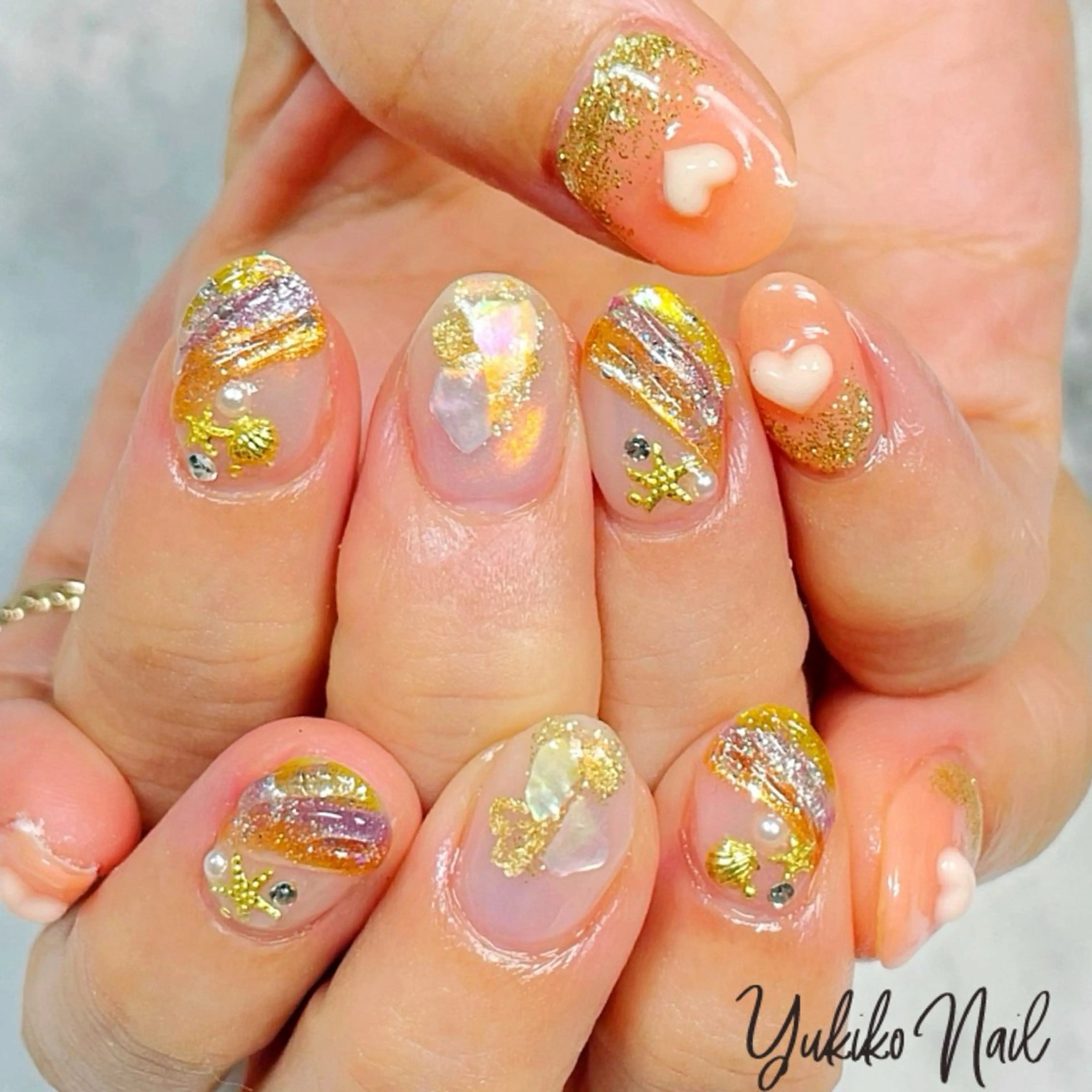 ネイル オーロラネイル マグネットネイル オレンジ 夏ネイル ユキコ ネイルのネイルデザイン