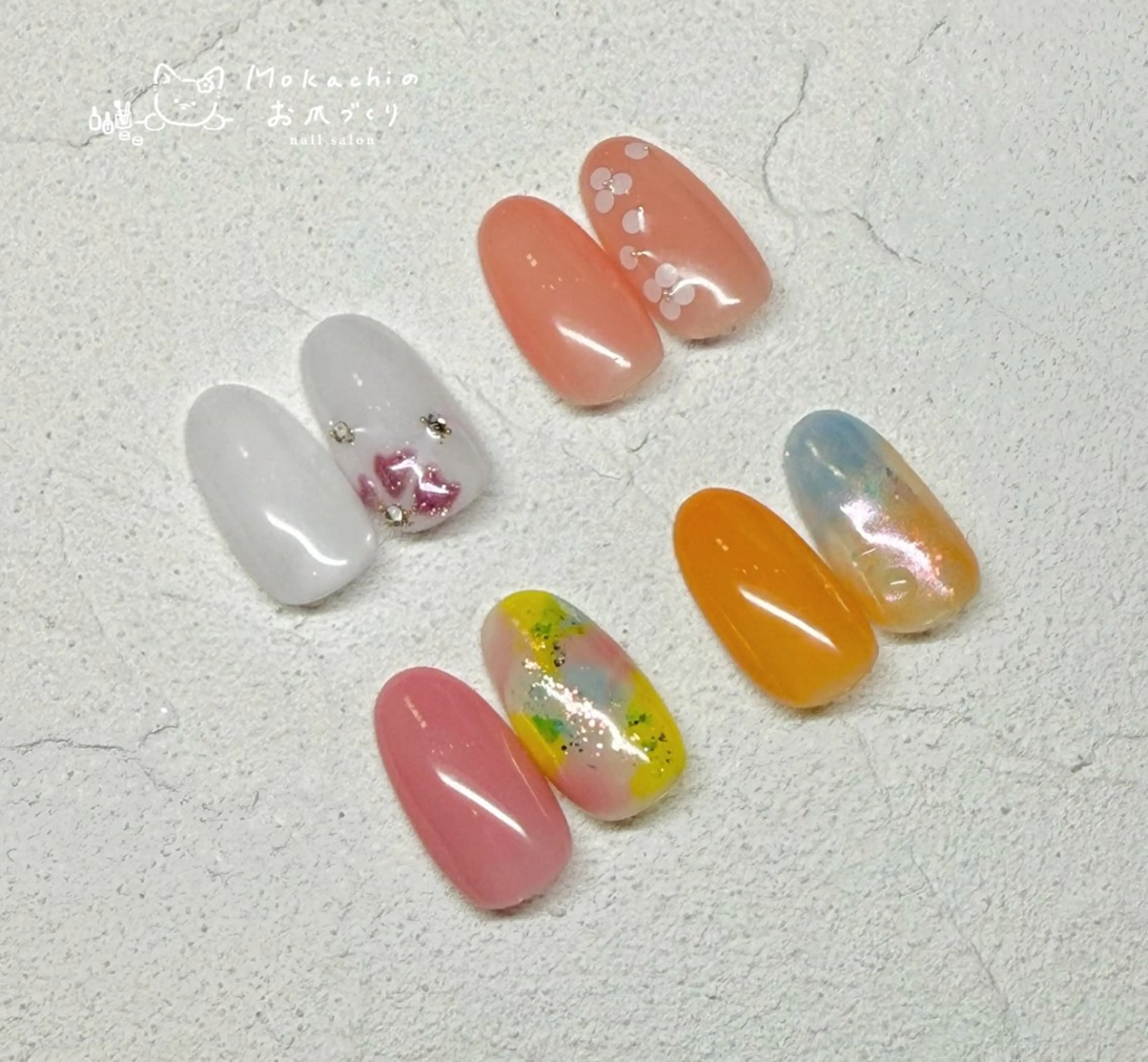 ネイル オレンジ ピンク 春ネイル Mokachiのお爪づくり所属・Mokachiの お爪づくりのネイルデザイン