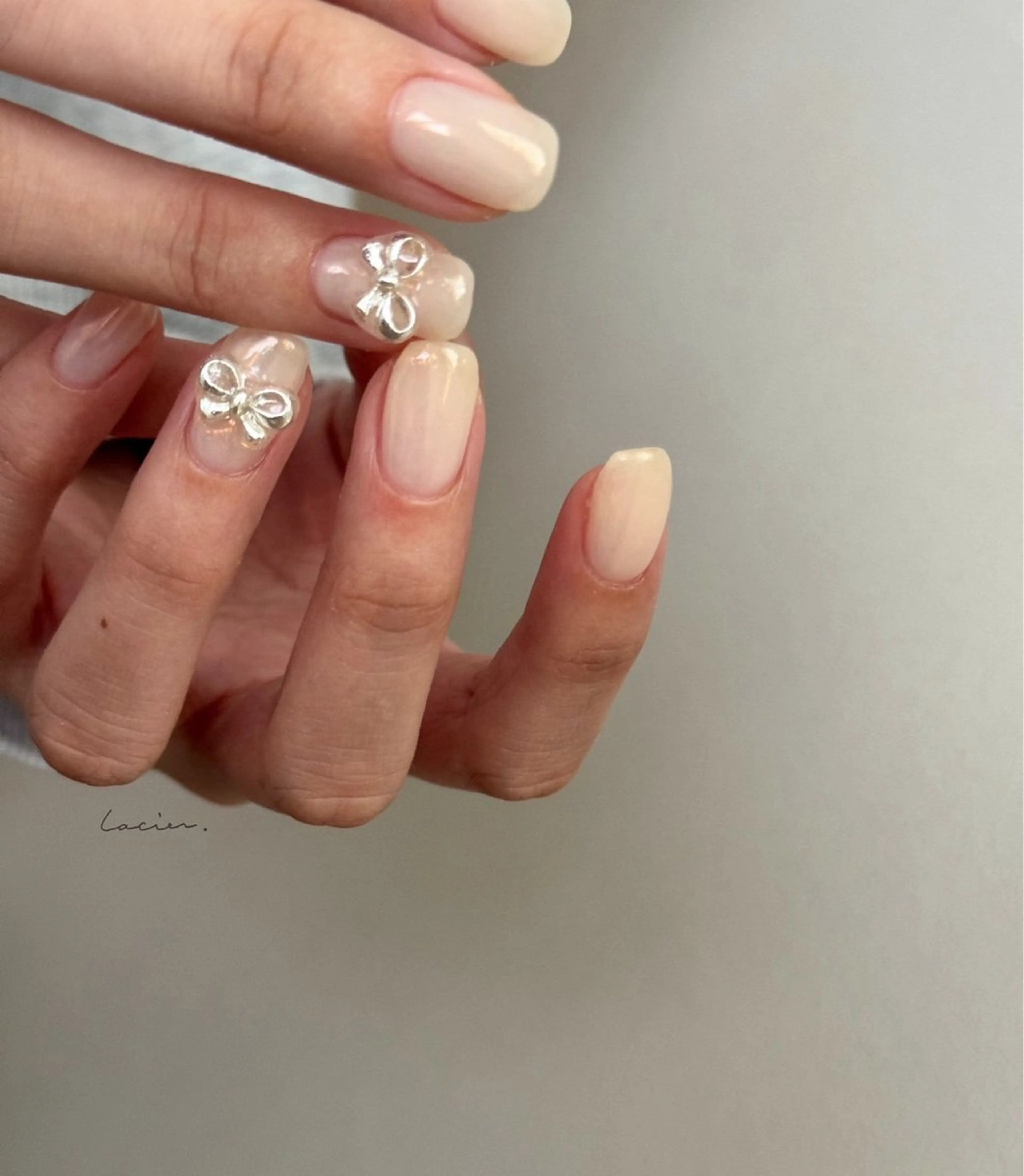 ネイル オーロラネイル ニュアンスネイル リボン lacier nailのネイルデザイン