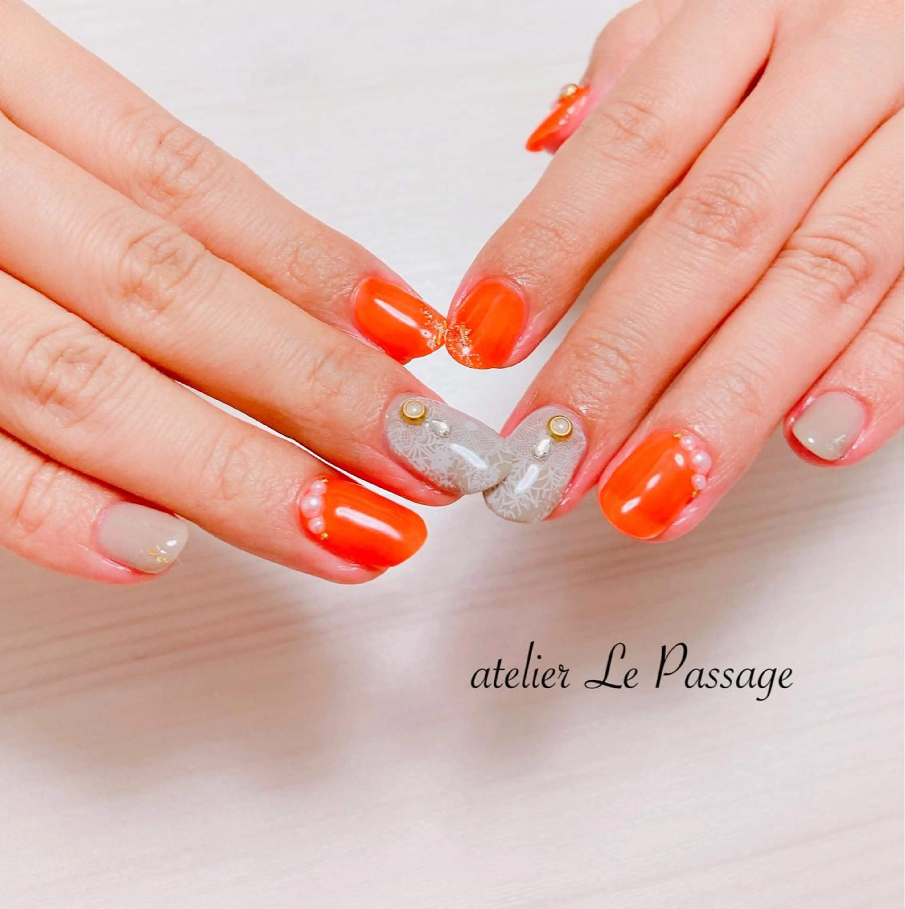 ネイル ジェルネイル レース オレンジ パラジェル 夏ネイル Atelier Le Passage所属・h nakatsukaのネイルデザイン