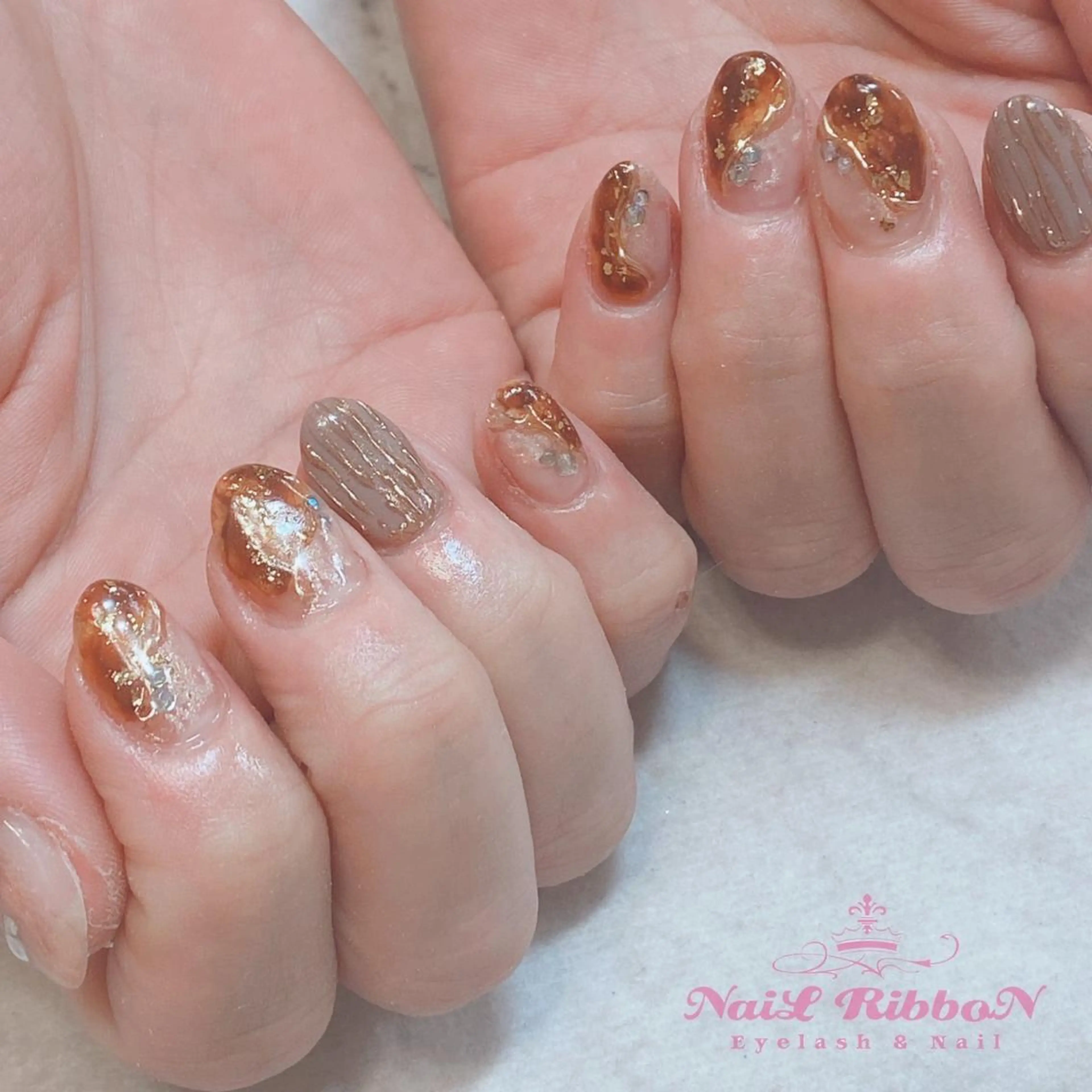 ネイル ネイルリボン 受付スタッフのネイルデザイン