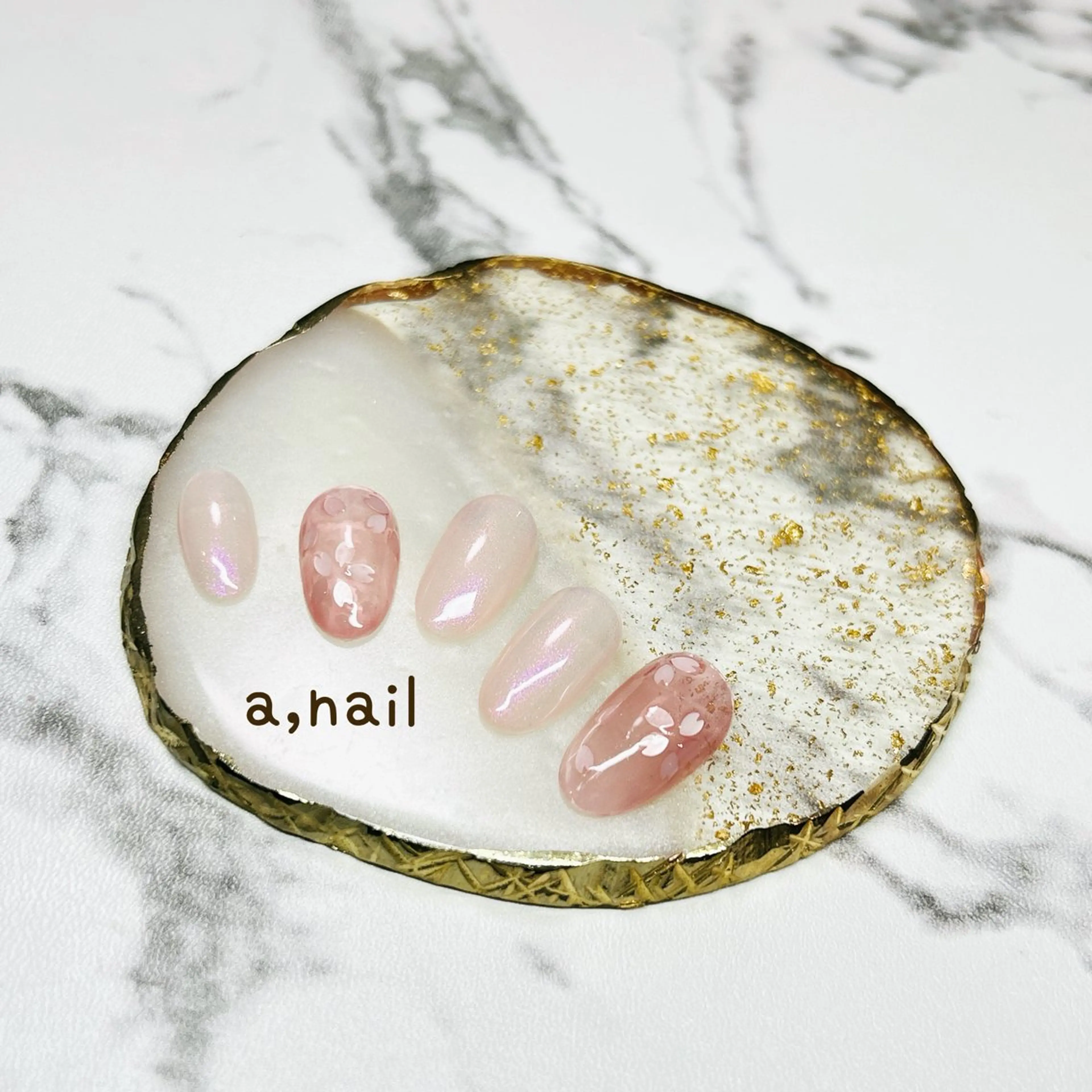 ネイル オーロラネイル 桜ネイル フラワーネイル キラキラネイル オフィスネイル ハンドネイル ネイルサロン エーネイルのネイルデザイン