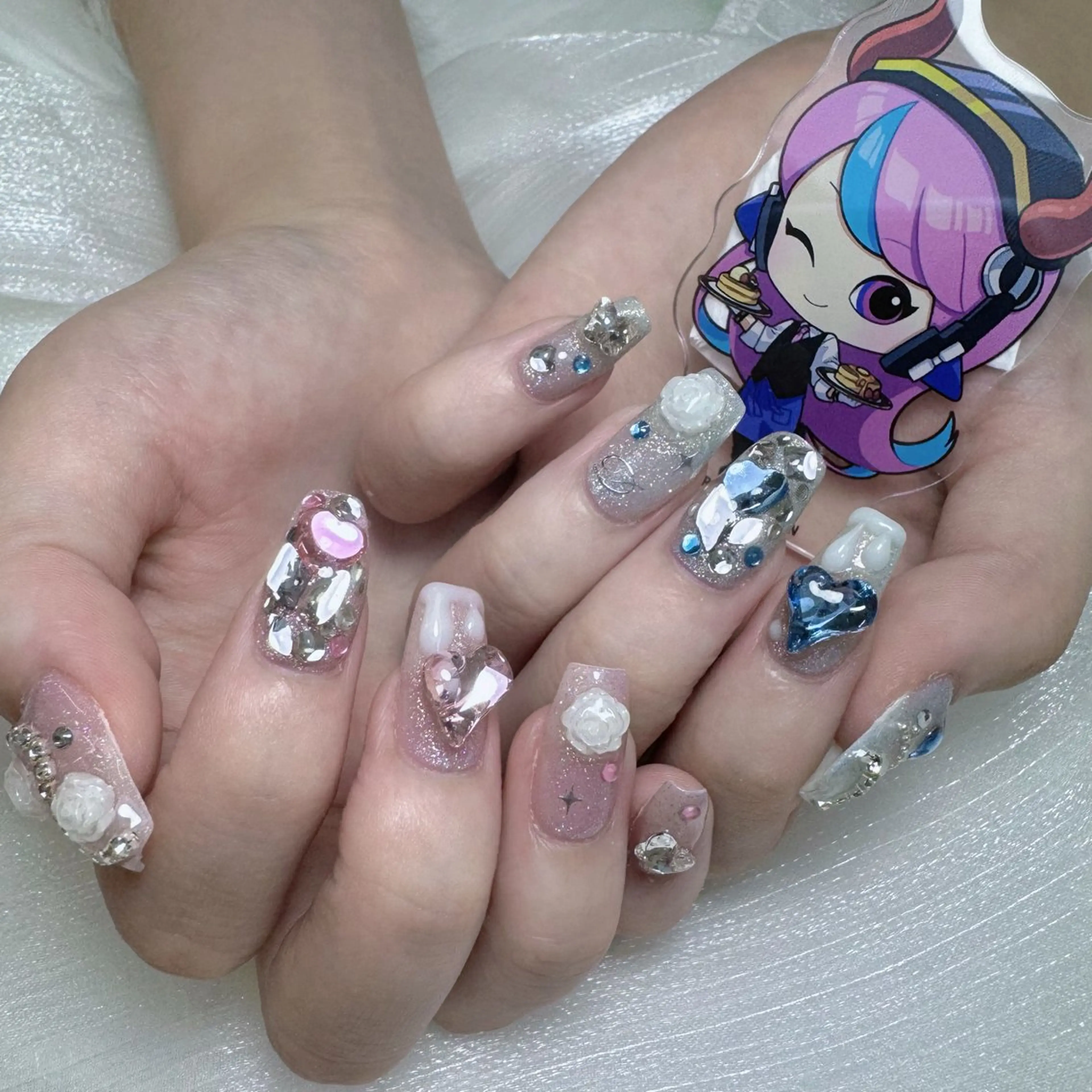 ネイル ガーリー キラキラネイル 水色 ロングネイル 夏ネイル ハンドネイル princess👑 木戸　唯のネイルデザイン