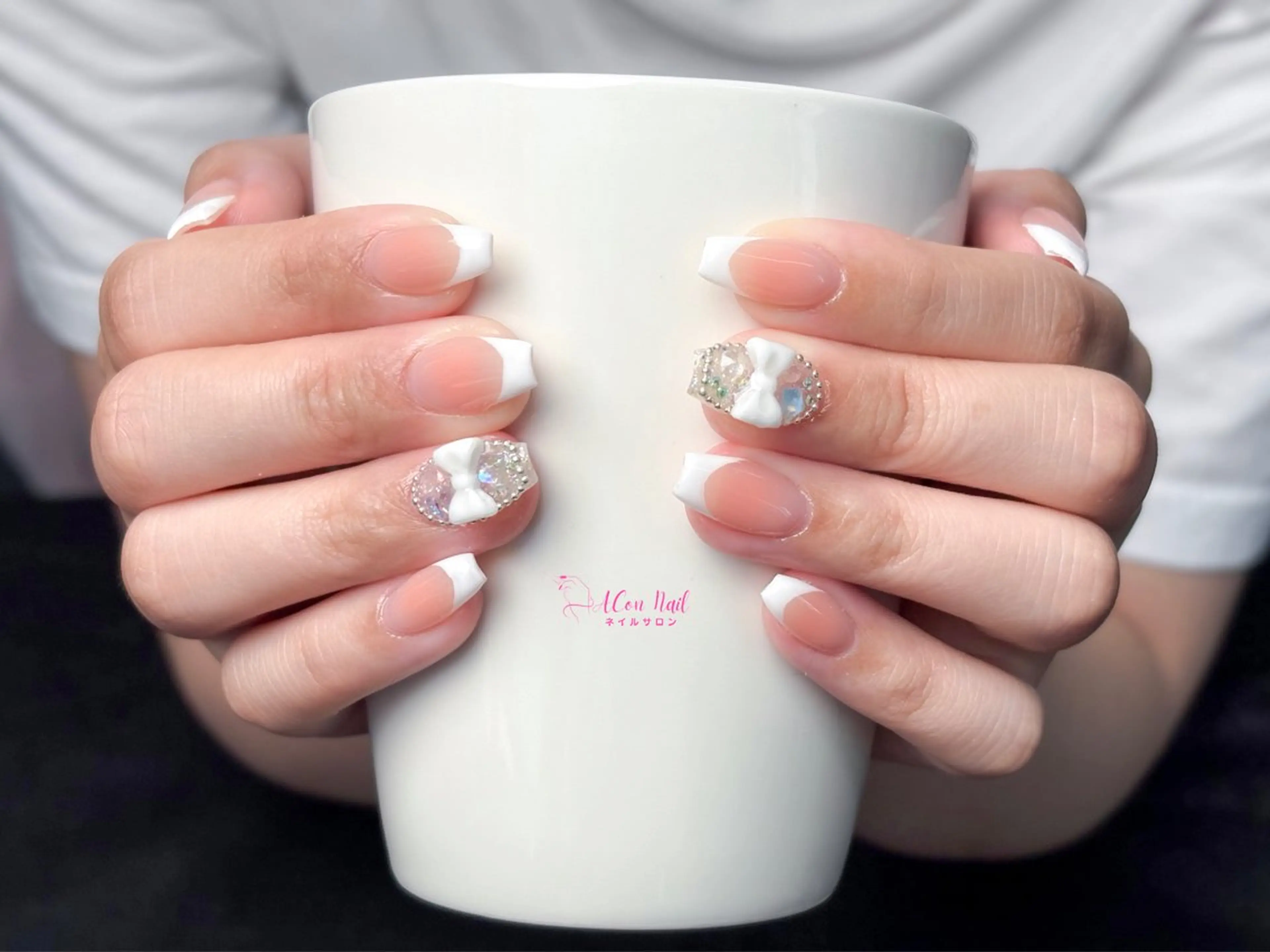 ネイル 桜ネイル 長さ出し フラワーネイル フレンチネイル ジェルネイル ハンドネイル ACon NailSalonのネイルデザイン