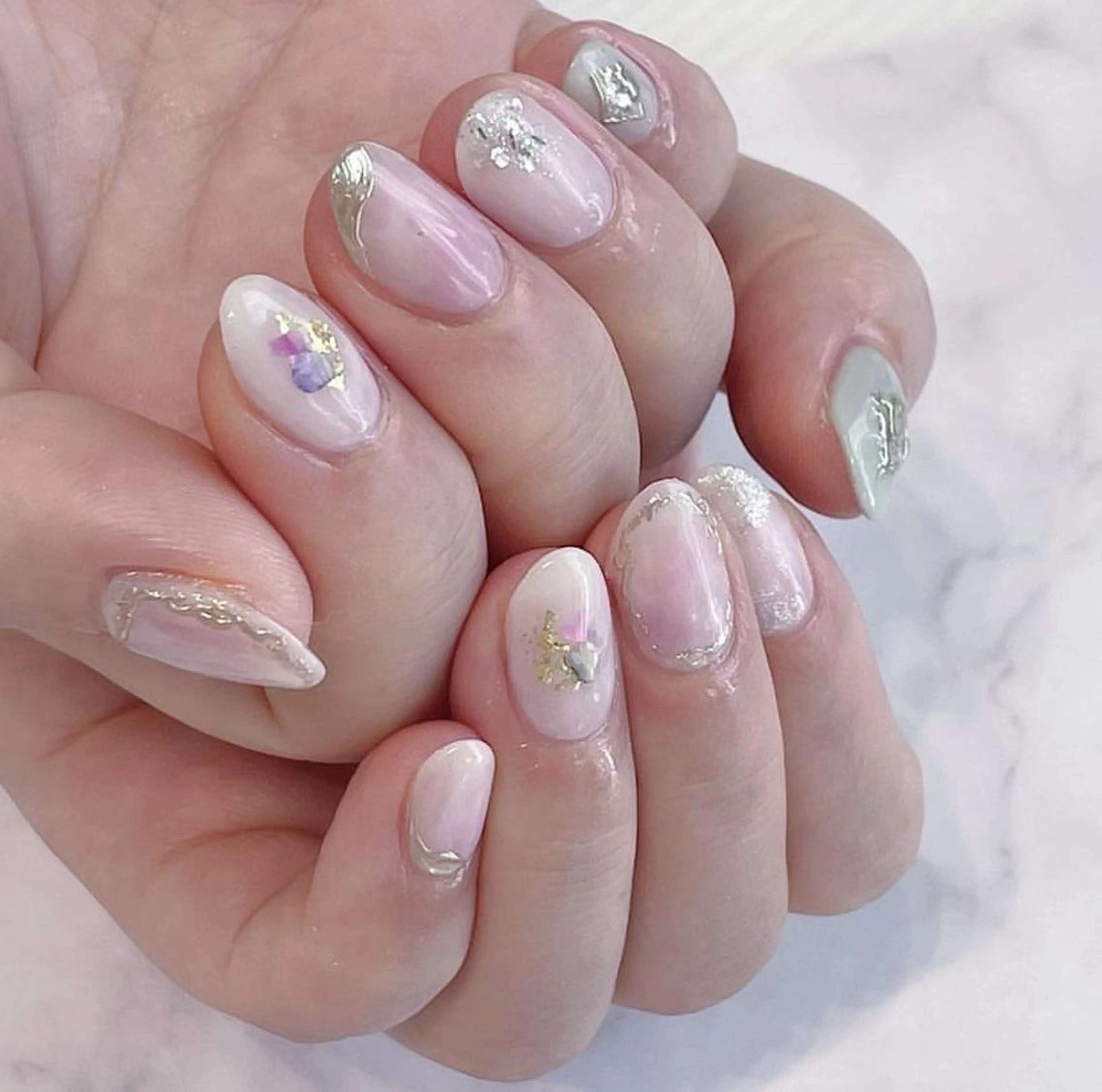 ネイル RAFFINE haru🦋🩵のネイルデザイン