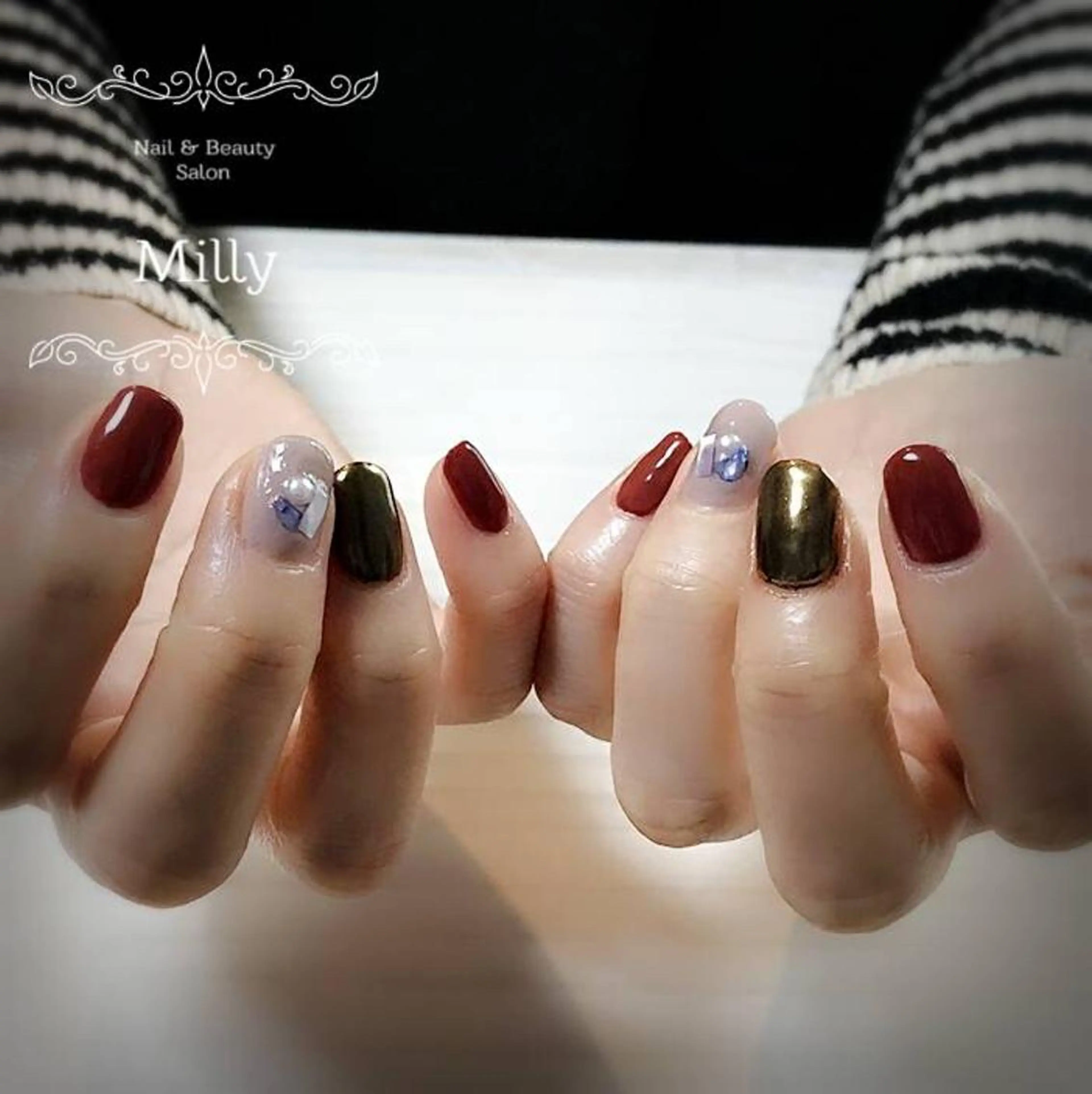 ネイル ミラーネイル 赤色 milly nail （予約担当)のネイルデザイン