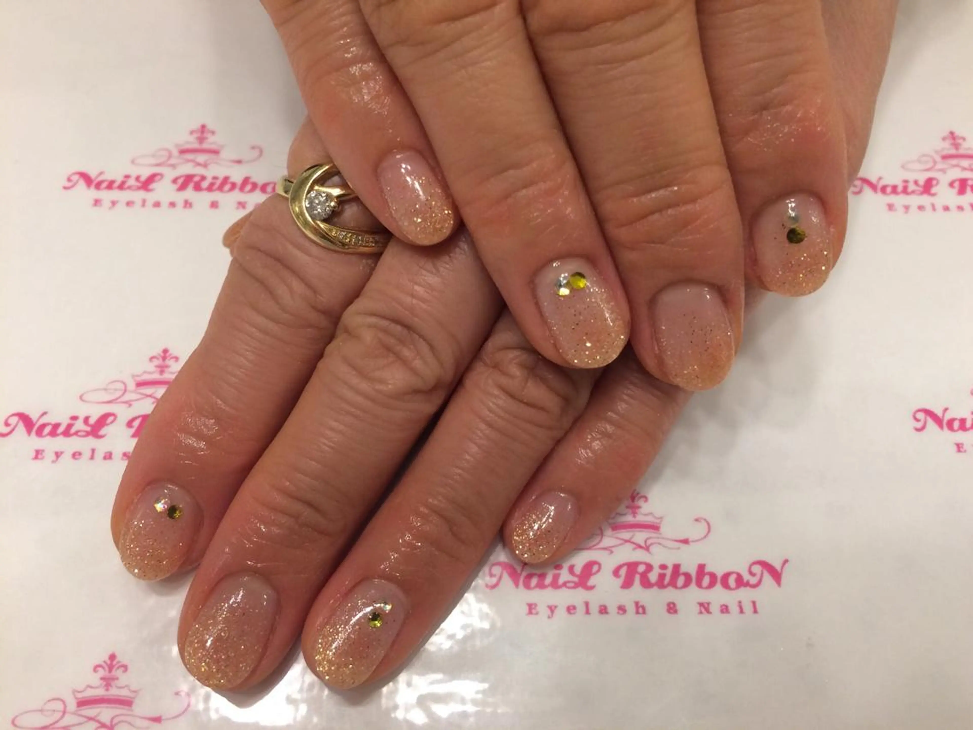 ネイル 春ネイル ネイルリボン 受付スタッフのネイルデザイン