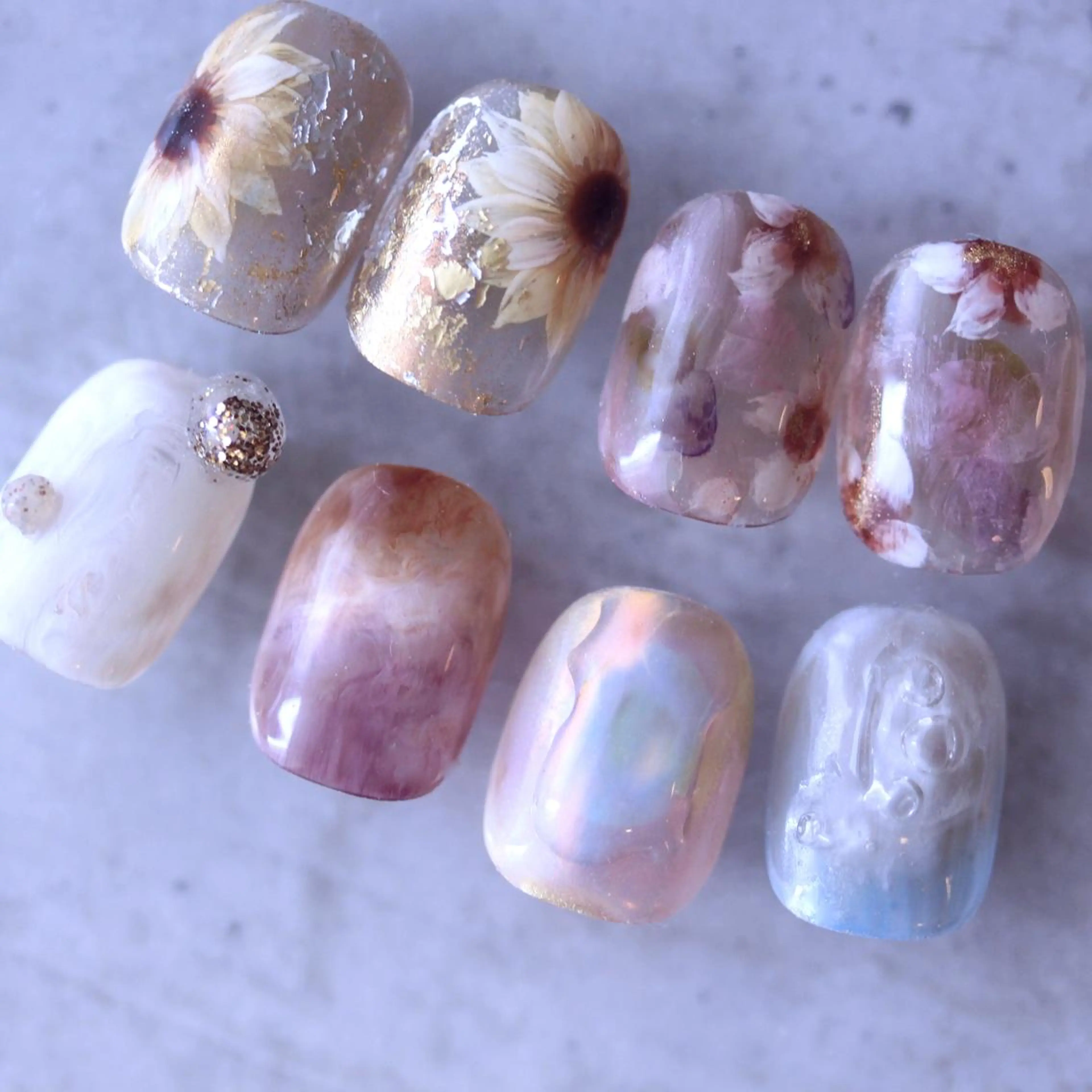 ネイル フラワーネイル 氷ネイル・うるうるネイル ニュアンスネイル オフィスネイル ピンク Elio 国泰寺のネイルデザイン