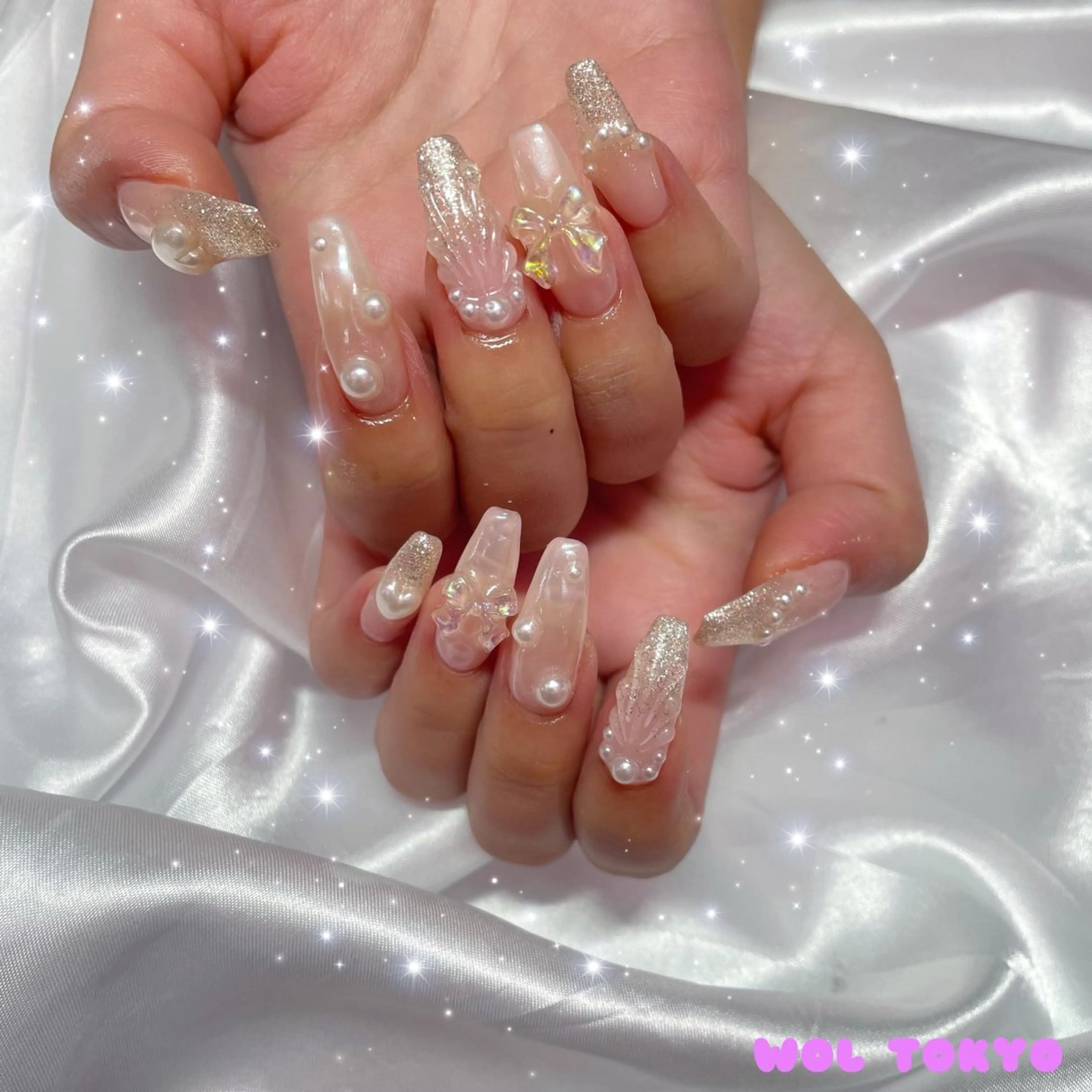 ネイル アートネイル オーロラネイル ロングネイル リボン 💕WOLTOKYO 池袋💕maiのネイルデザイン