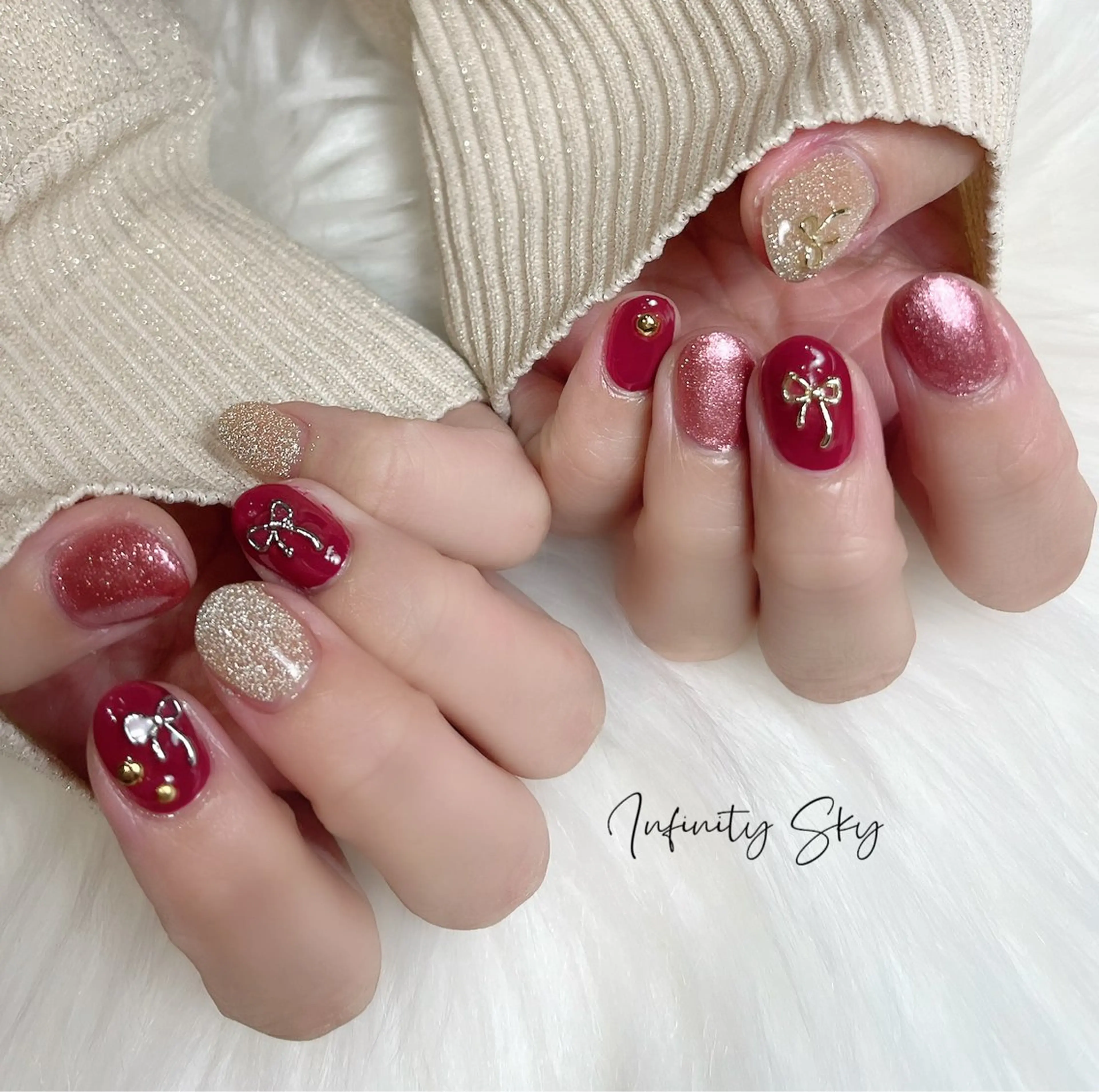 ネイル 赤色 リボン 冬ネイル クリスマス infinity skyのネイルデザイン