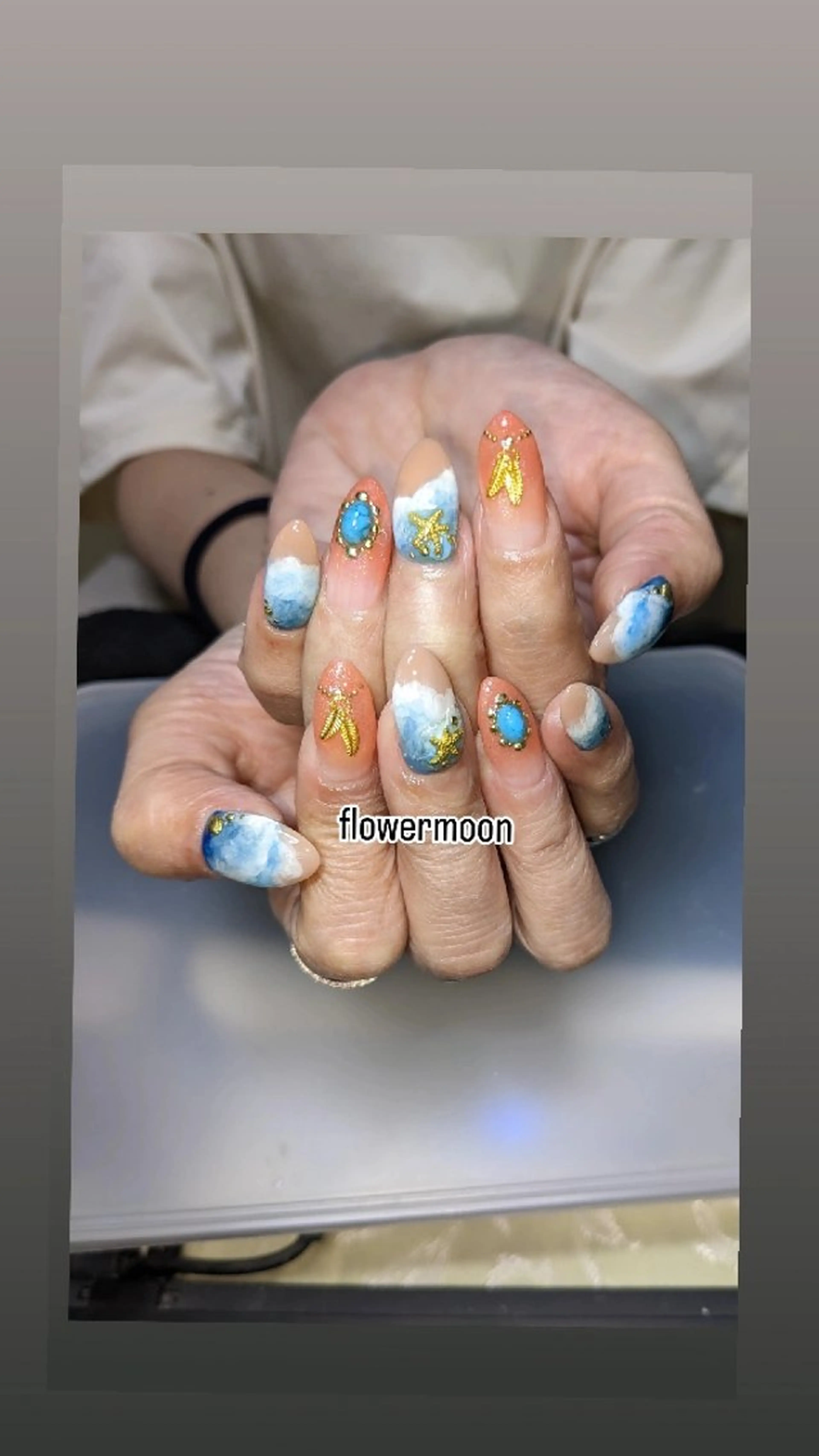 ネイル ハンドネイル ハンドケア フラワー ムーンのネイルデザイン