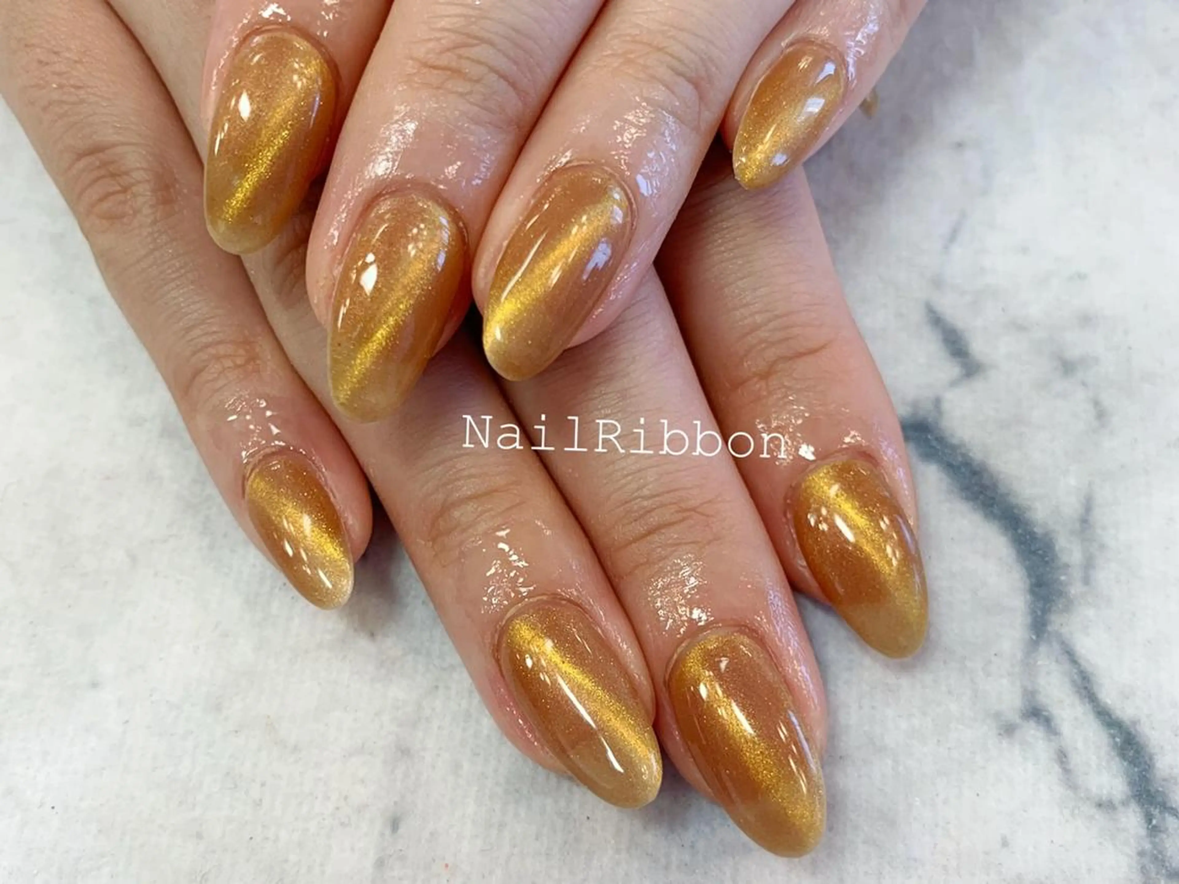 ネイル ネイルリボン 受付スタッフのネイルデザイン