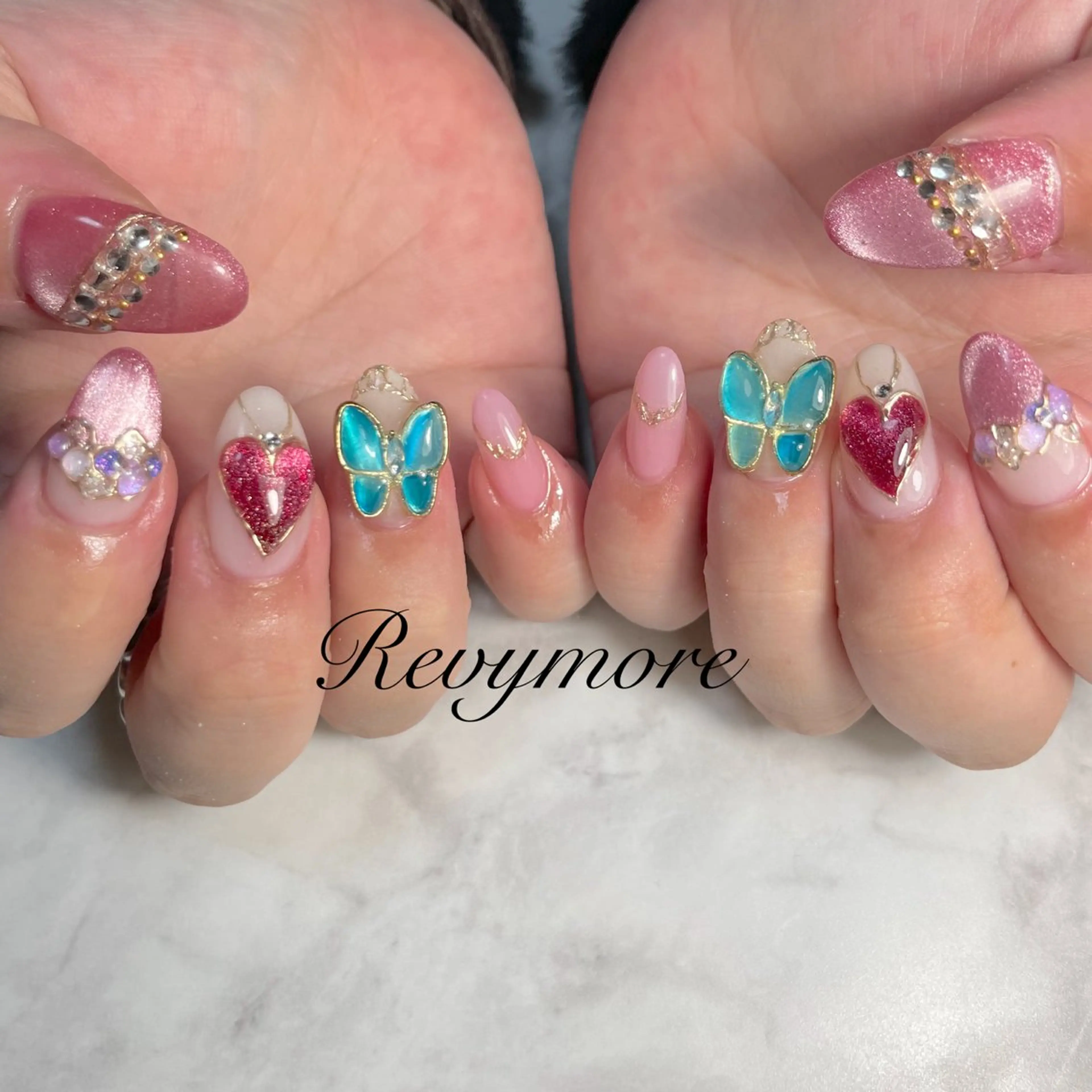 ネイル ジェルネイル ハート 水色 ニュアンスネイル オフィスネイル ハンドネイル nail salon Revymoreのネイルデザイン