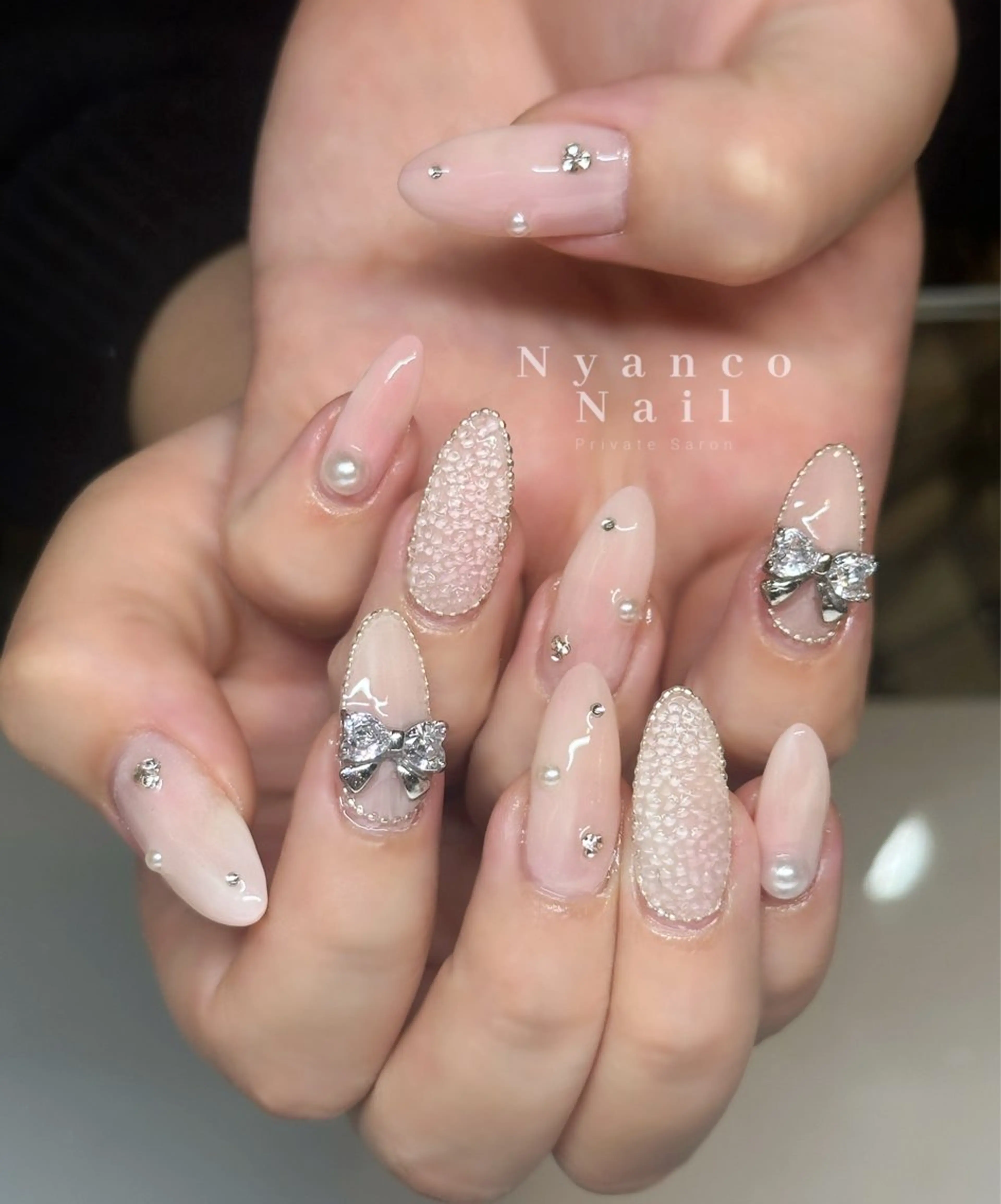 ネイル ジェルネイル キラキラネイル ピンク リボン 春ネイル Nyanco Nailのネイルデザイン