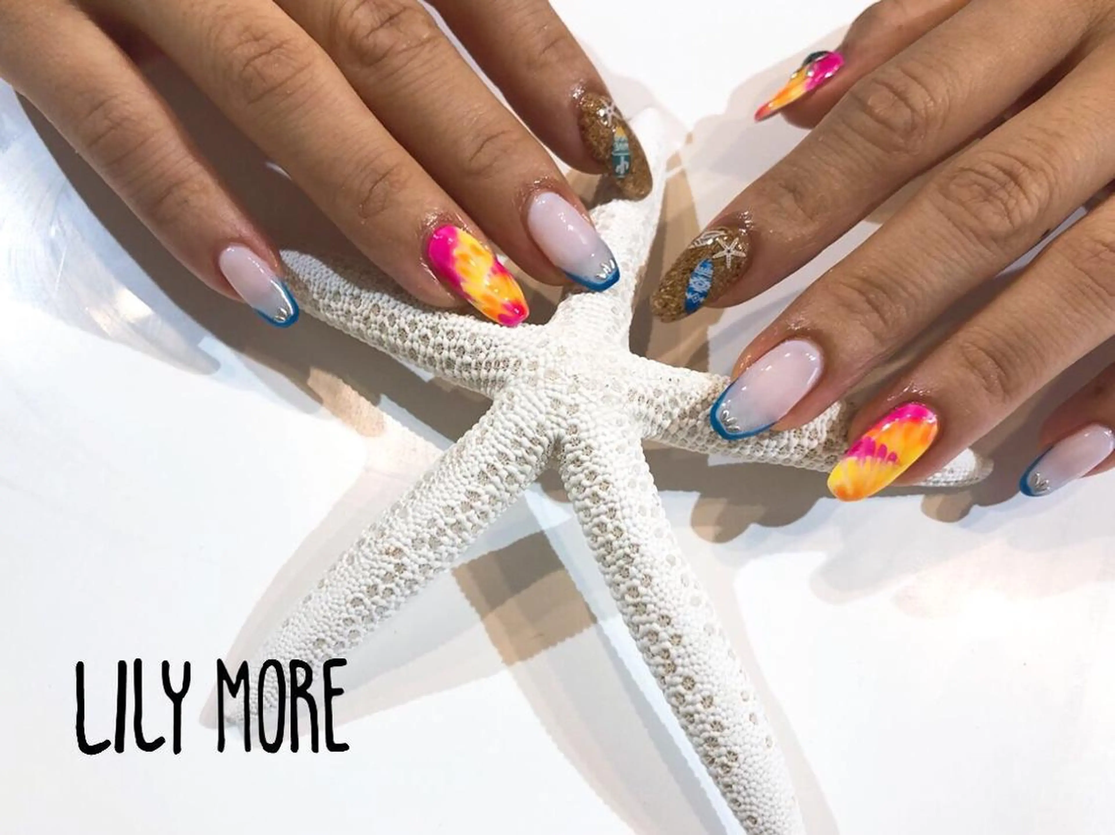 ネイル ピーコックネイル Lily closetのネイルデザイン