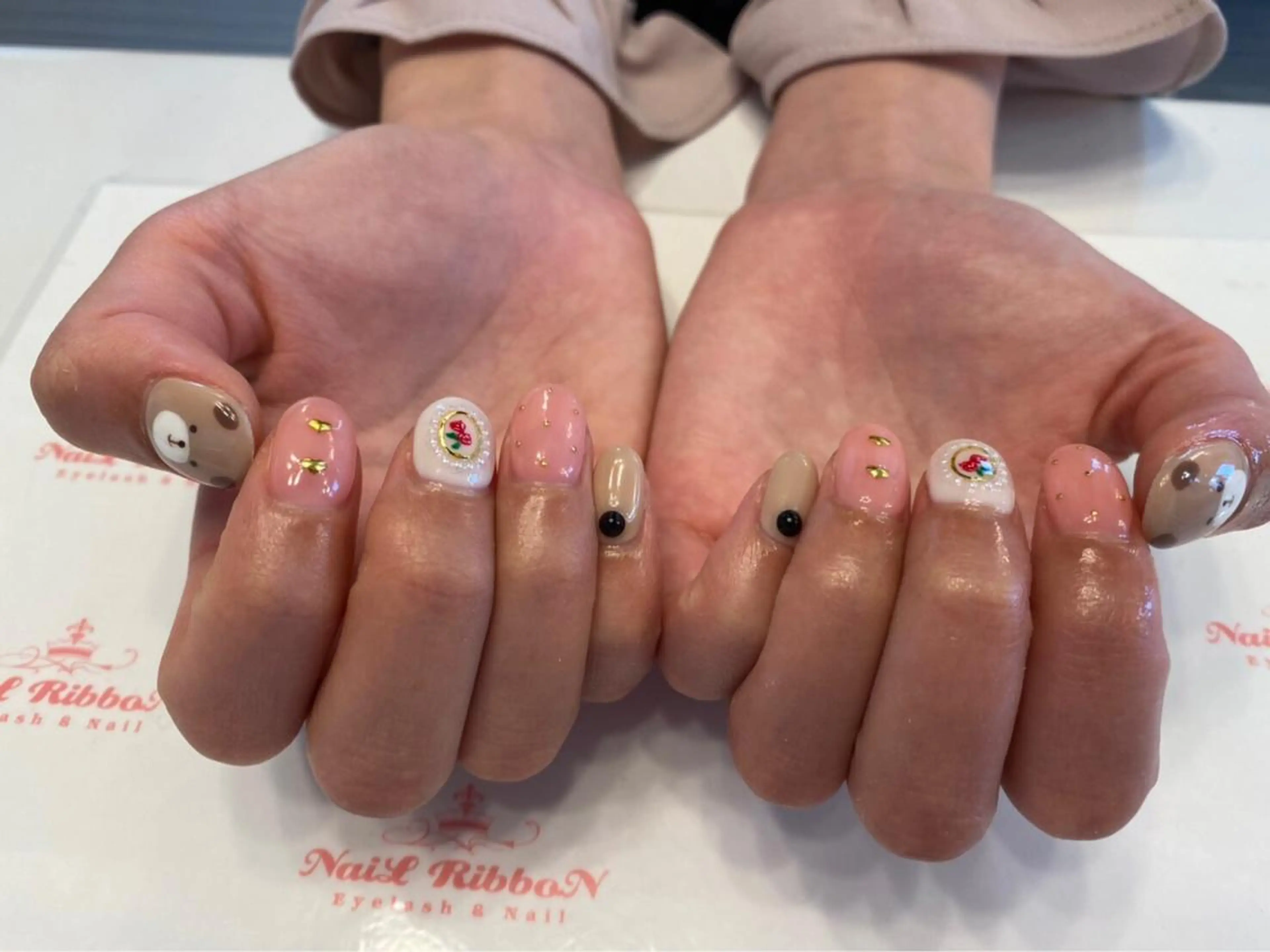 ネイル 春ネイル ネイルリボン 受付スタッフのネイルデザイン