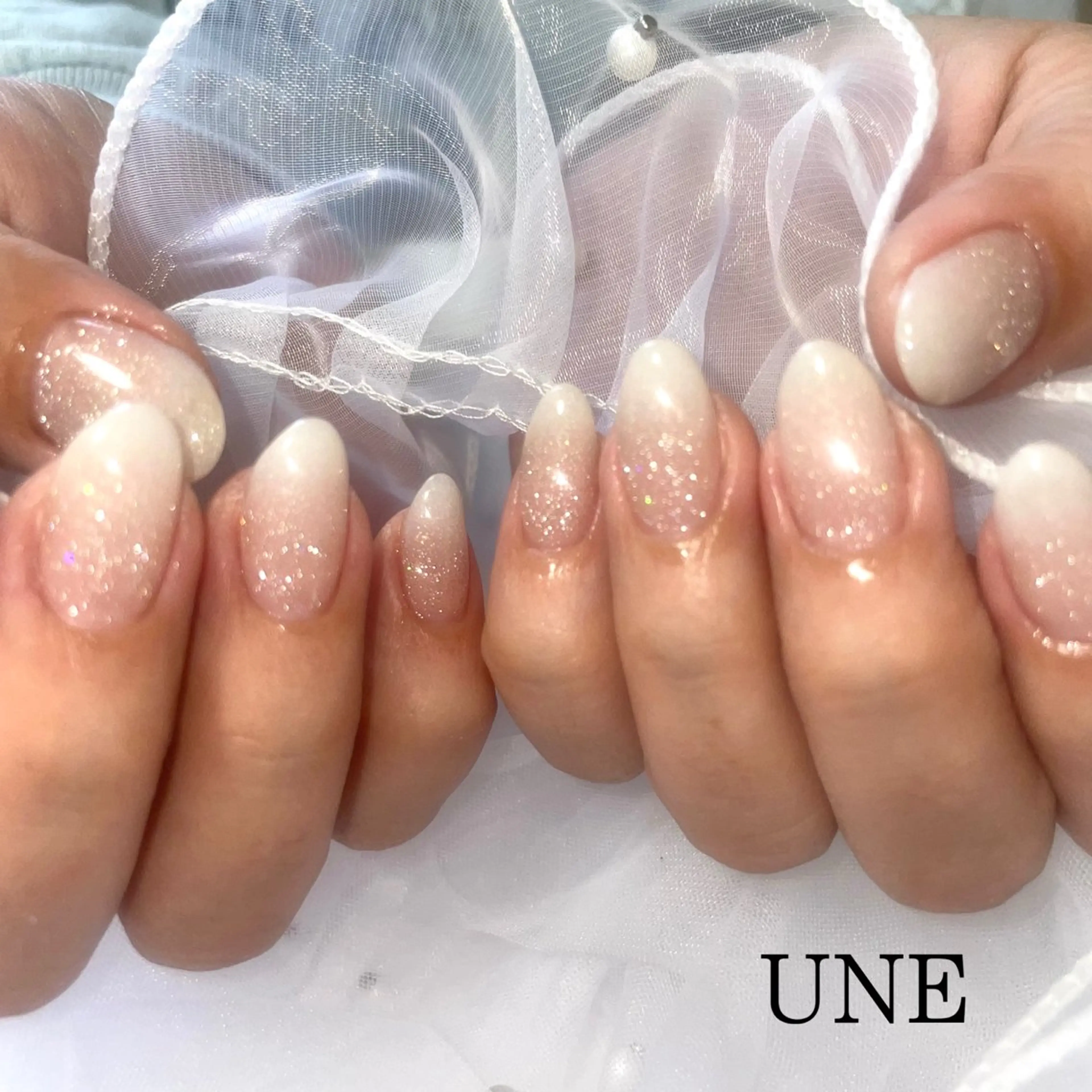 ミディアム UNE.【ユヌ】 Jr.NANAのネイルデザイン