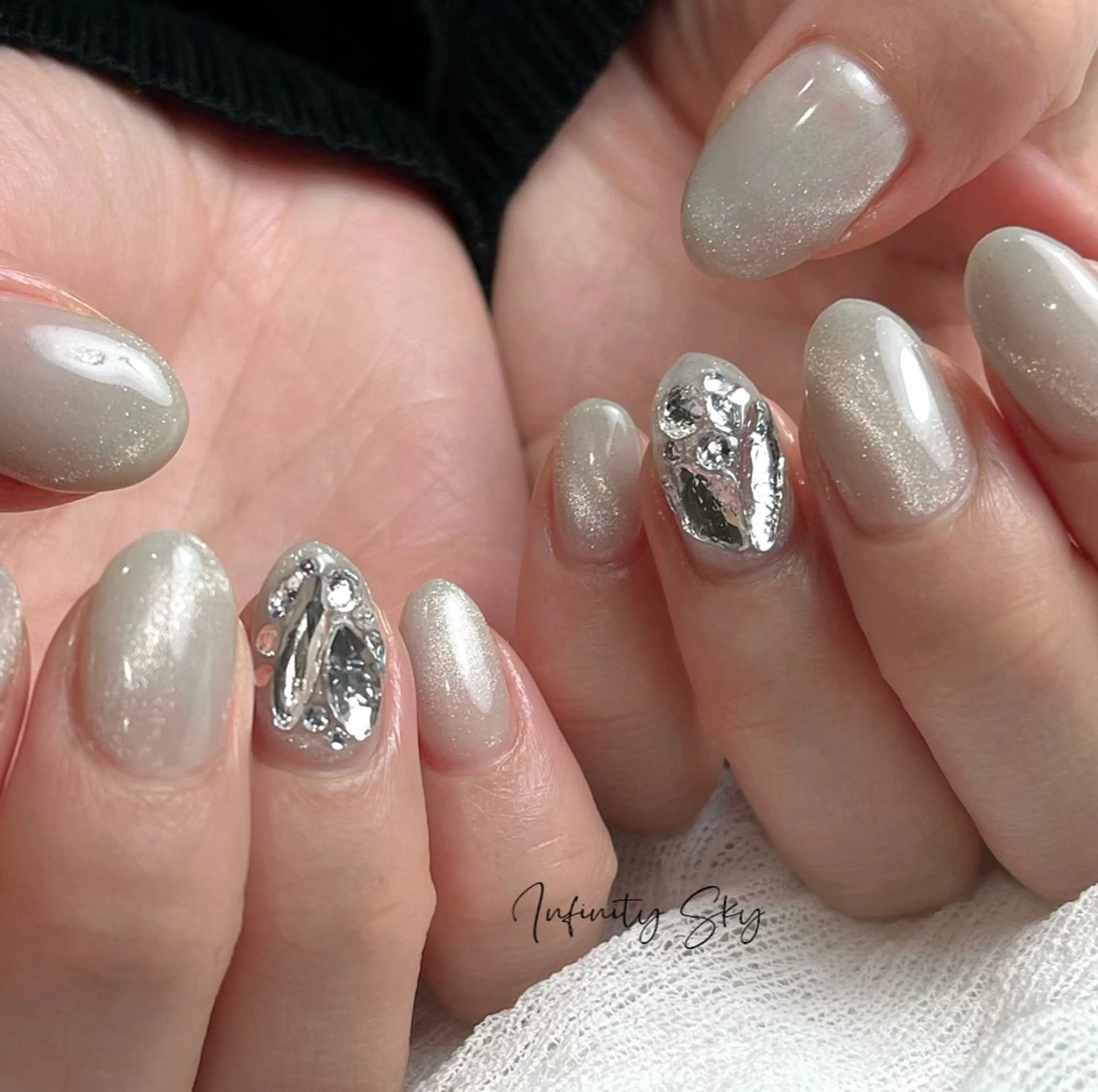 ネイル マグネットネイル ストーンネイル ホワイト infinity skyのネイルデザイン