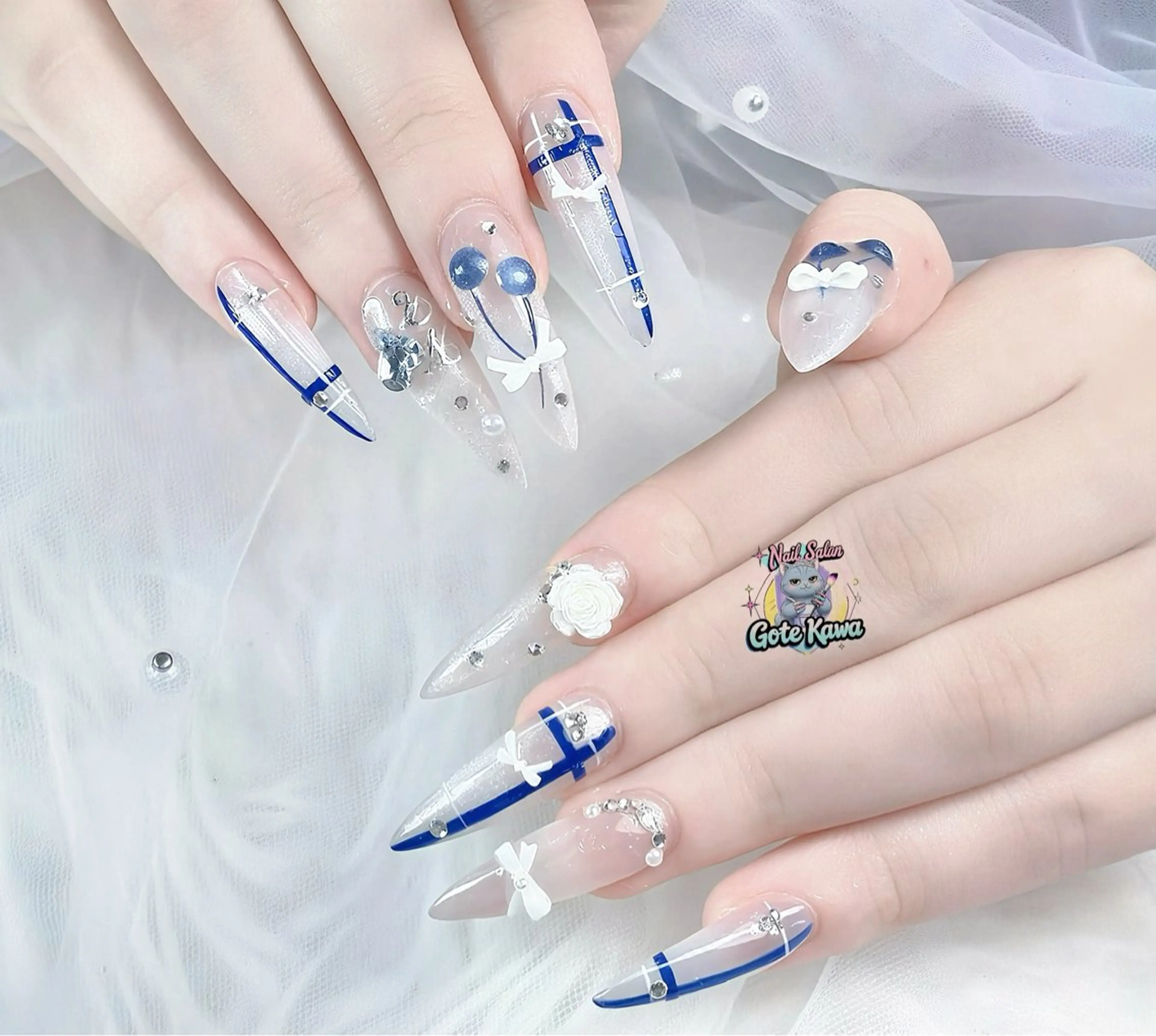 ネイル キラキラネイル リボン 春ネイル ワンホンネイル ハンドネイル ハンドケア Gote Kawa nail salonのネイルデザイン