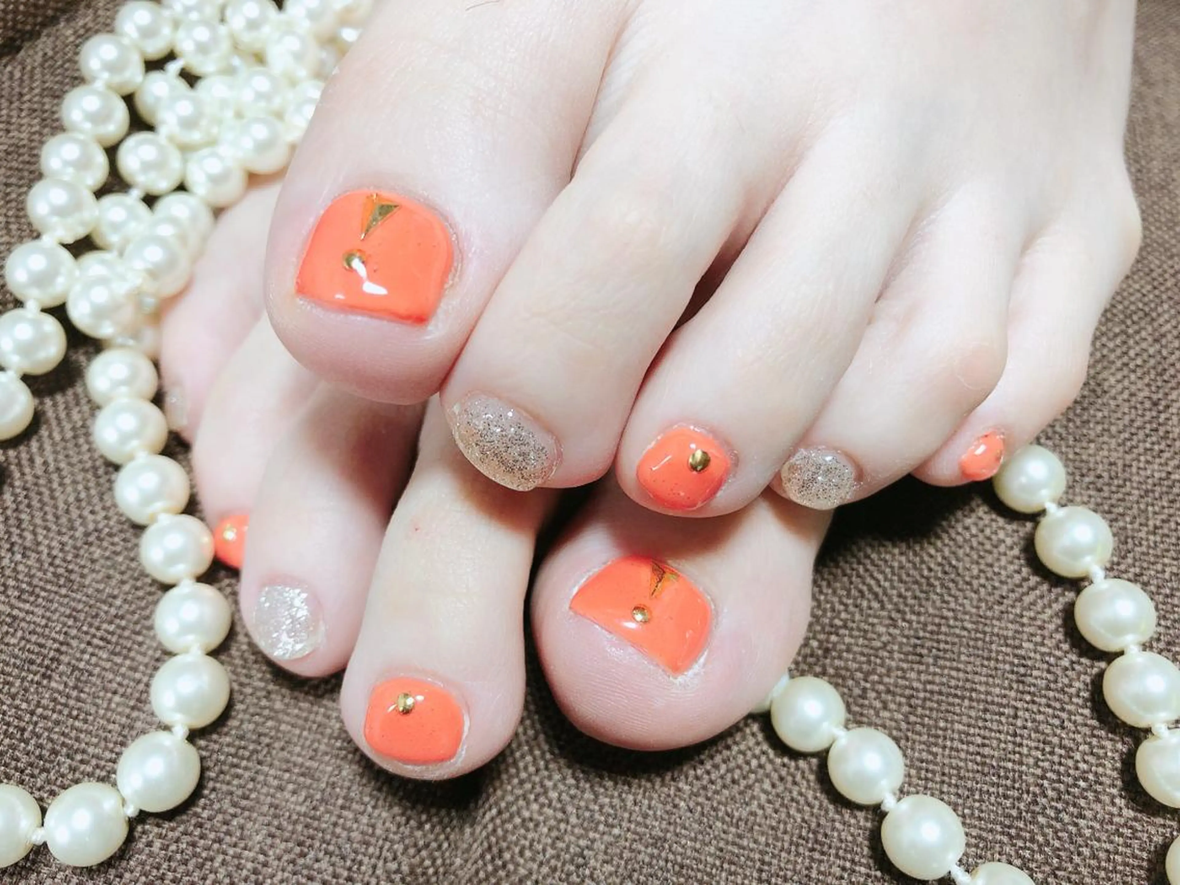 ネイル オレンジ フットネイル ネイル･脱毛サロン HARRYSのエステ・リラクイメージ