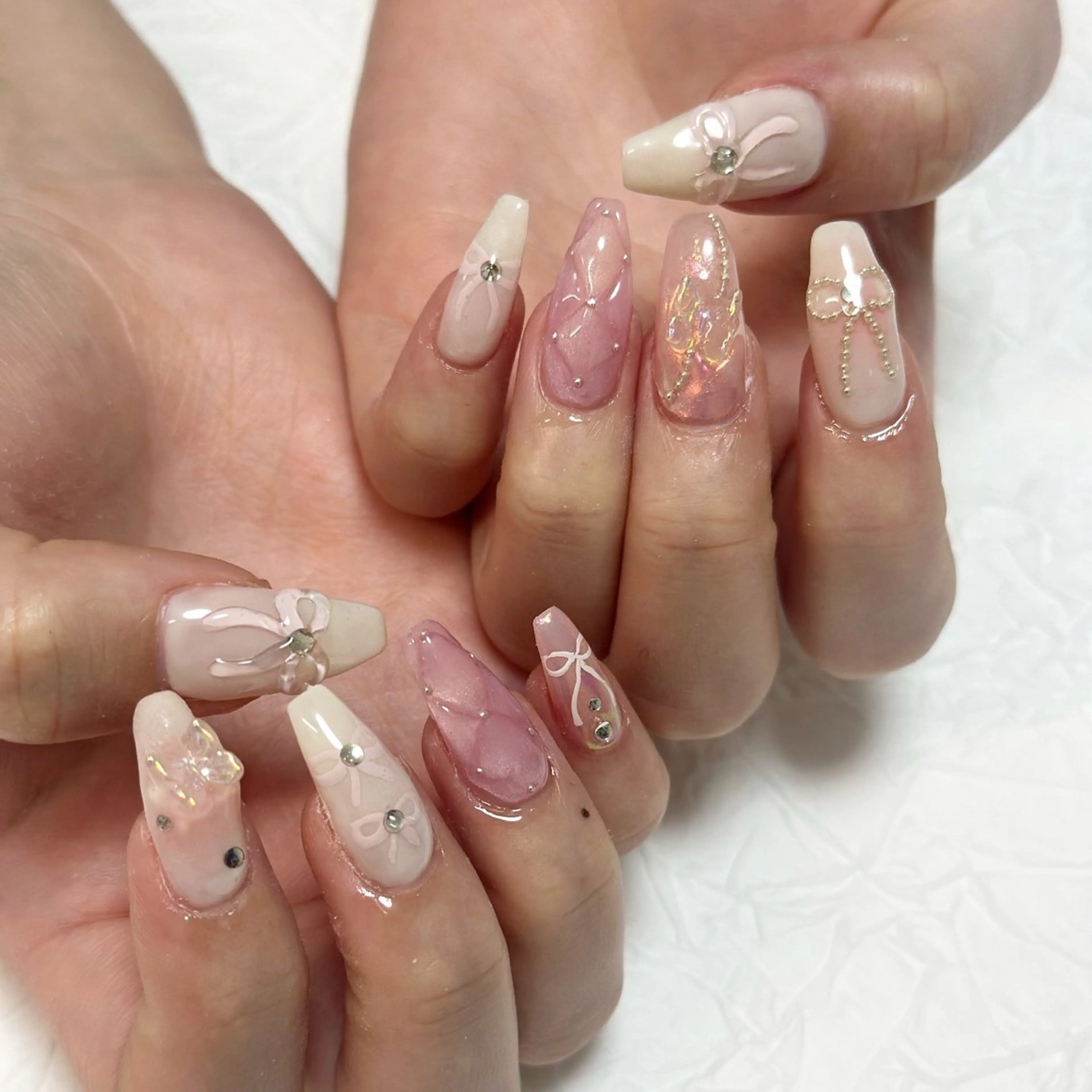 ネイル キラキラネイル ピンク リボン nailist yuiのネイルデザイン