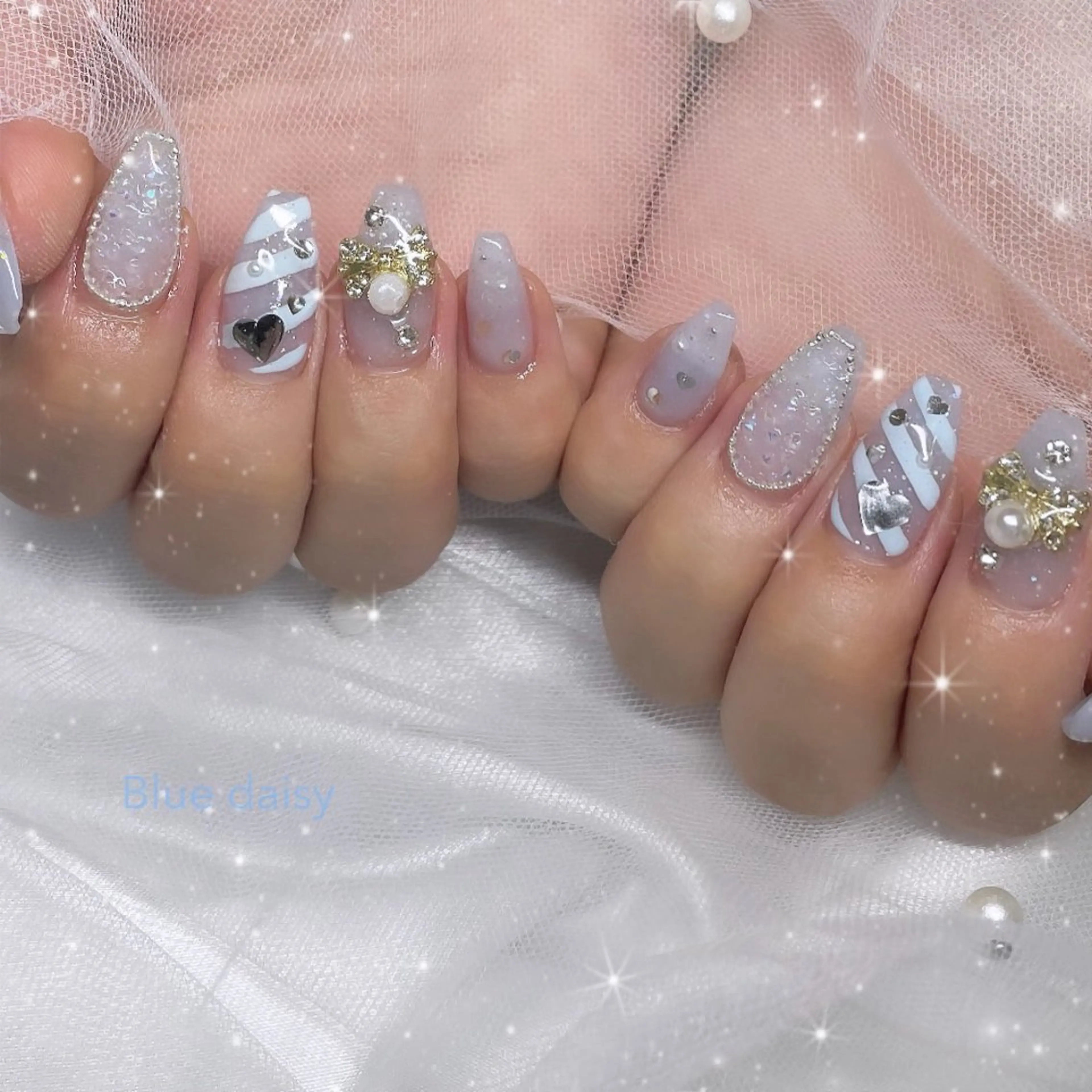 ネイル 水色 ハンドネイル Blue daisy 栄本店のネイルデザイン