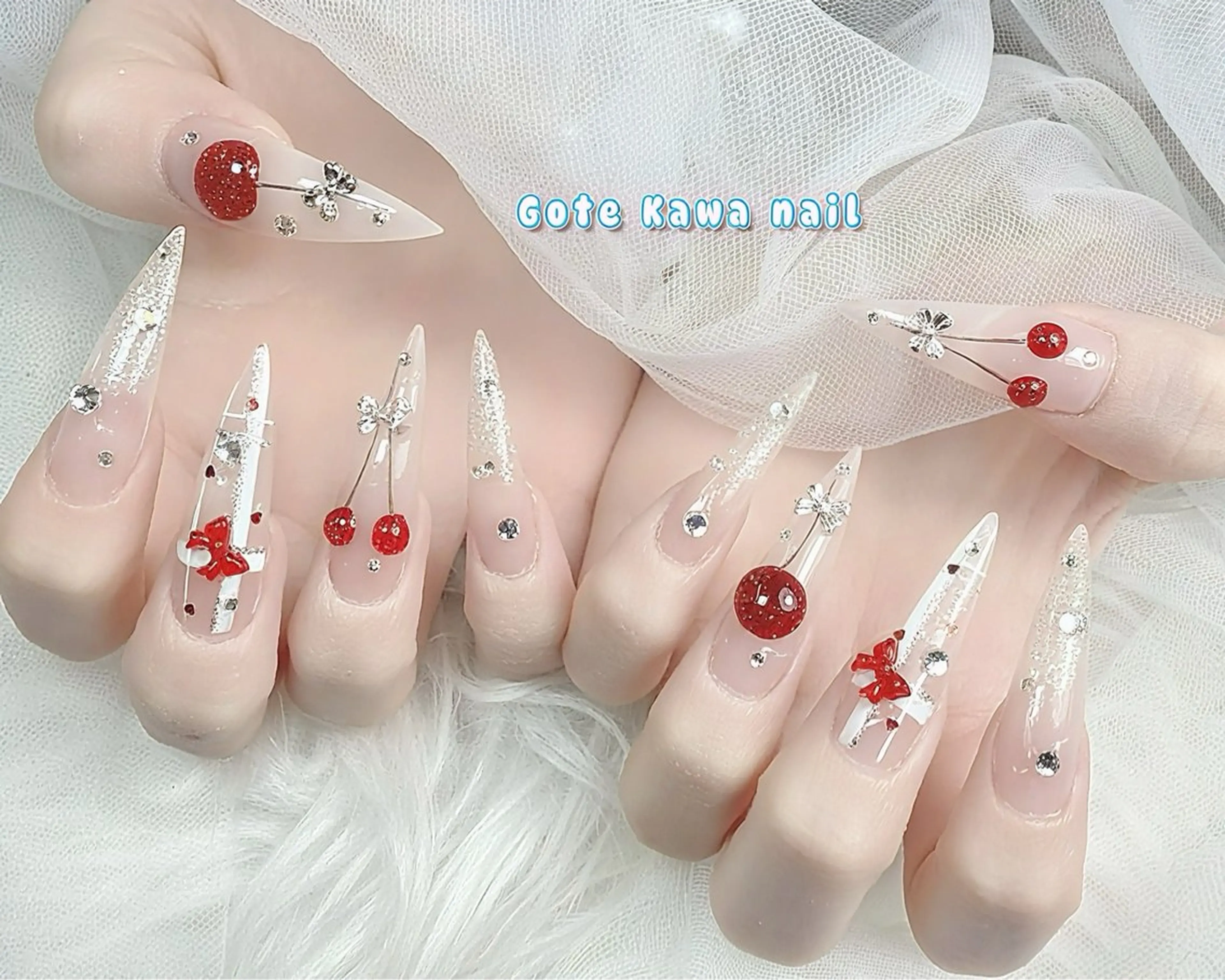 ネイル キラキラネイル リボン 春ネイル ハンドネイル ハンドケア Gote Kawa nail salonのネイルデザイン