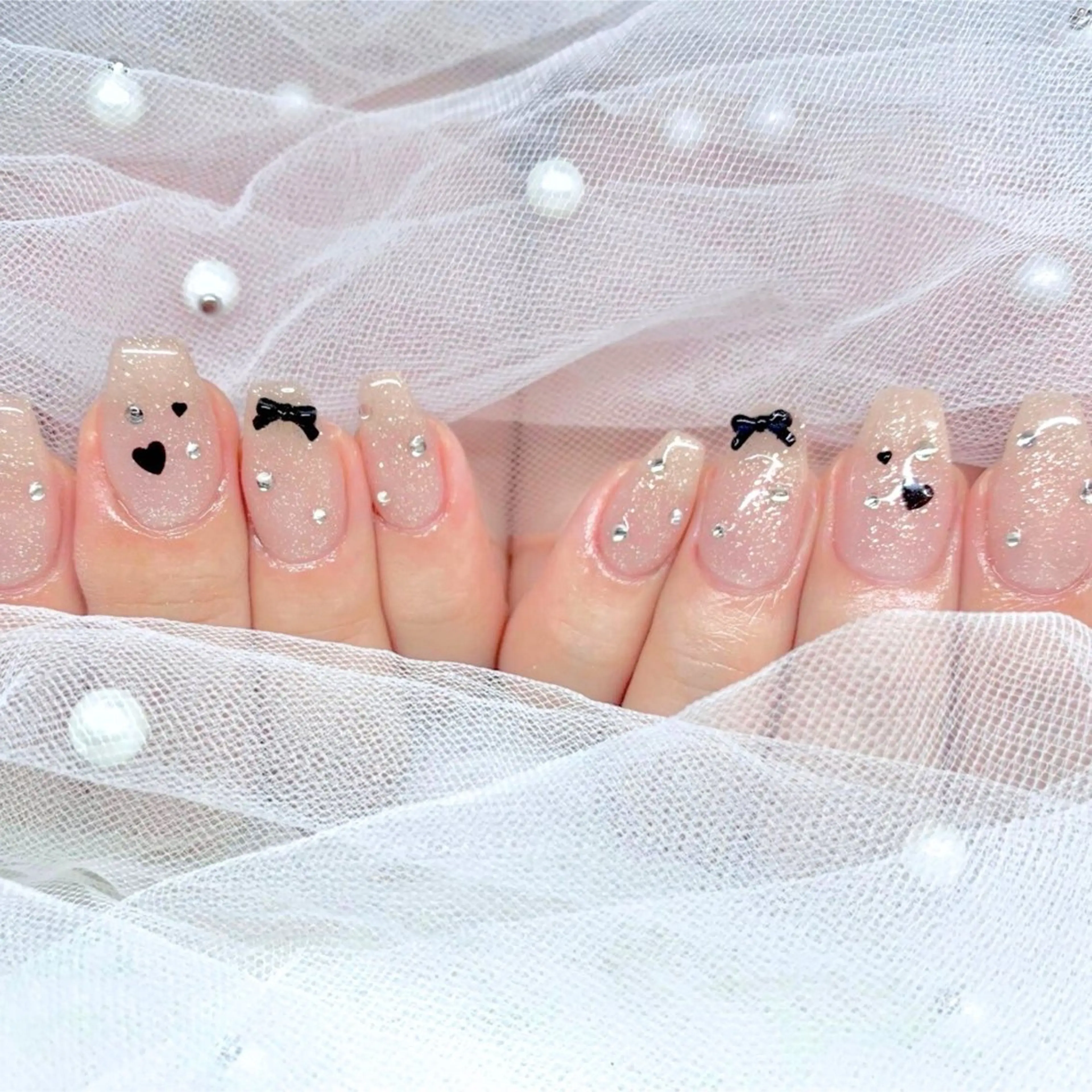 ネイル ハンドネイル TiTi Pomme Rinoのネイルデザイン