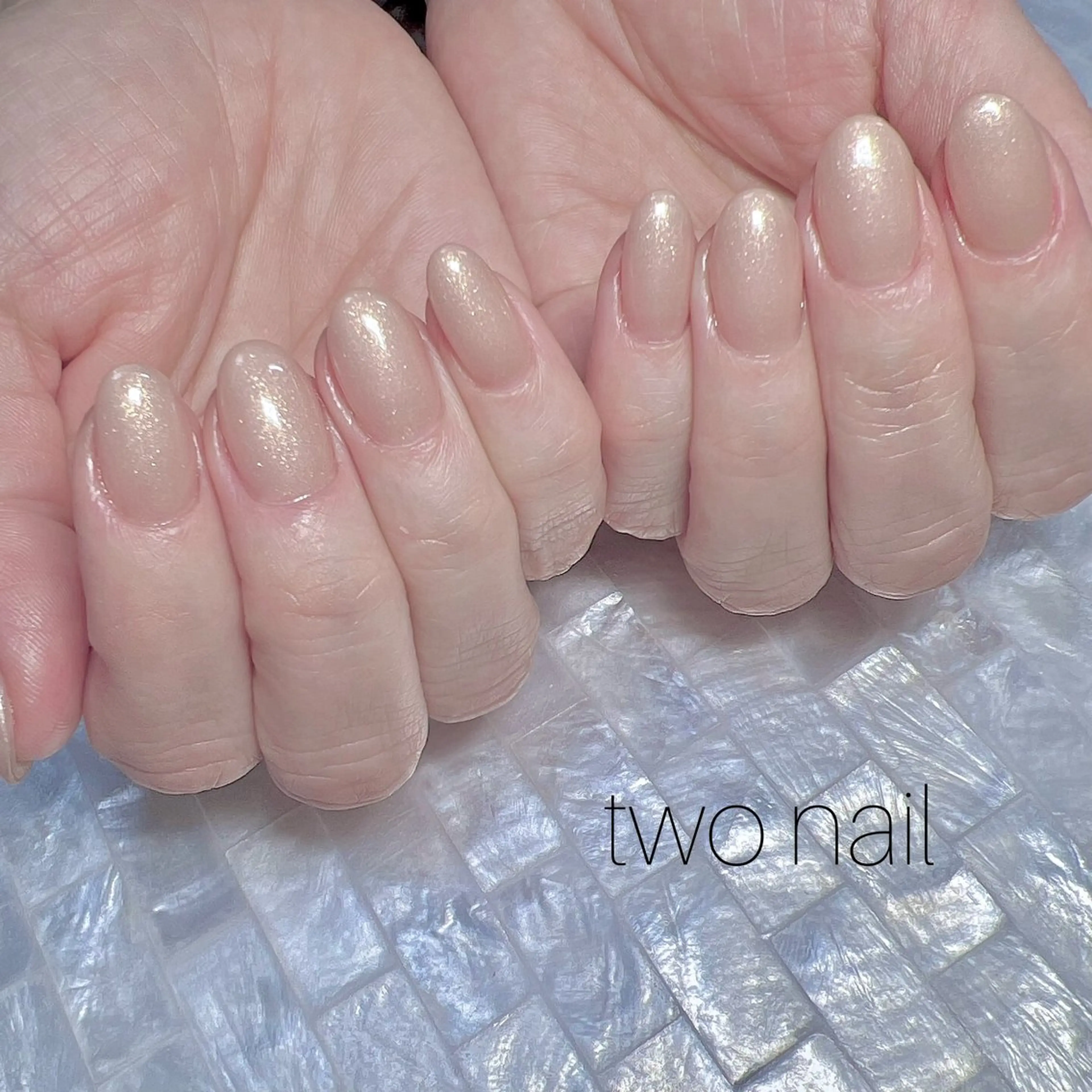 ネイル キラキラネイル ネイルチップ ホワイト ハンドネイル two nailのネイルデザイン