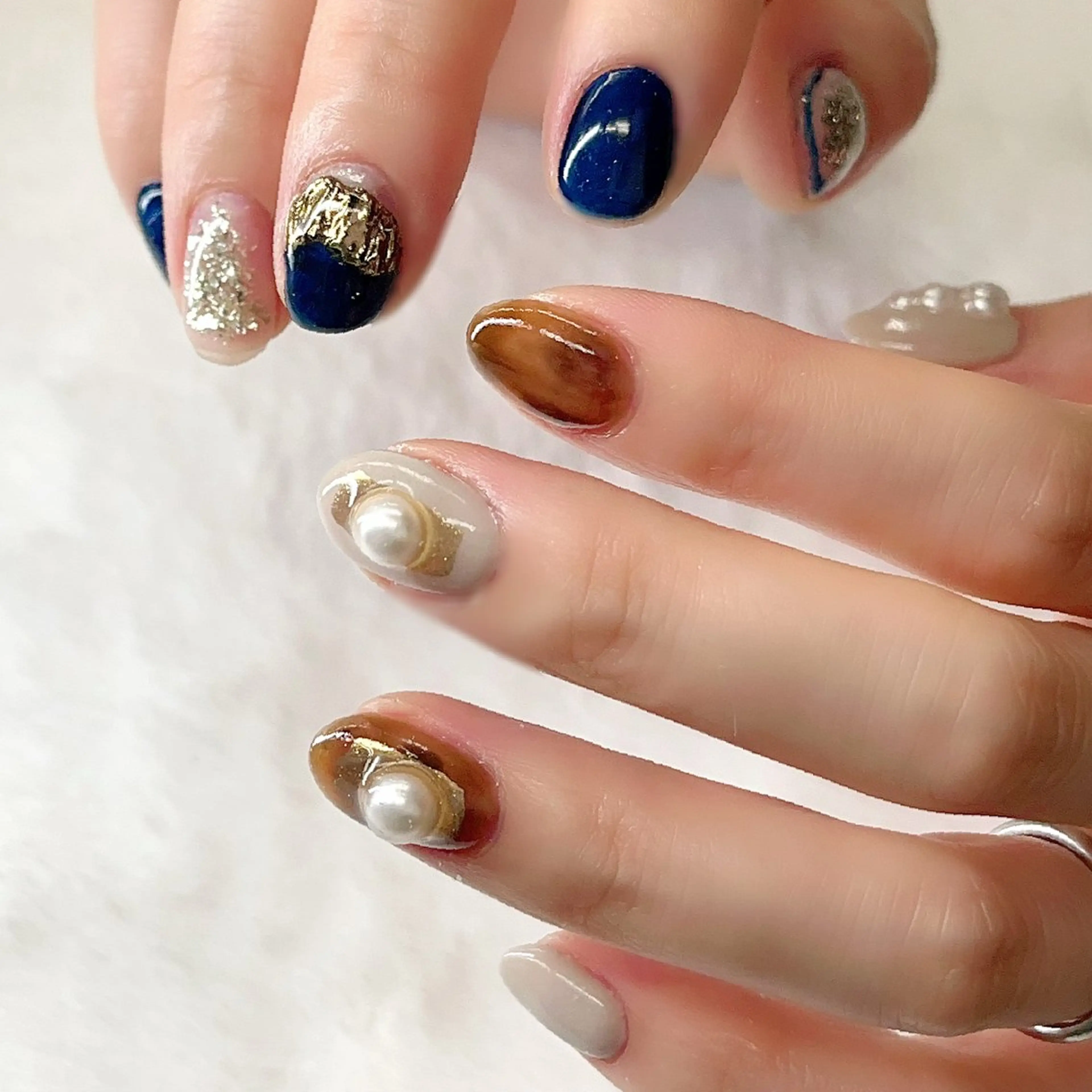 ネイル べっ甲ネイル ブルー キラキラネイル ラメ(グリッター) ミラーネイル RIONnail Yurikaのネイルデザイン