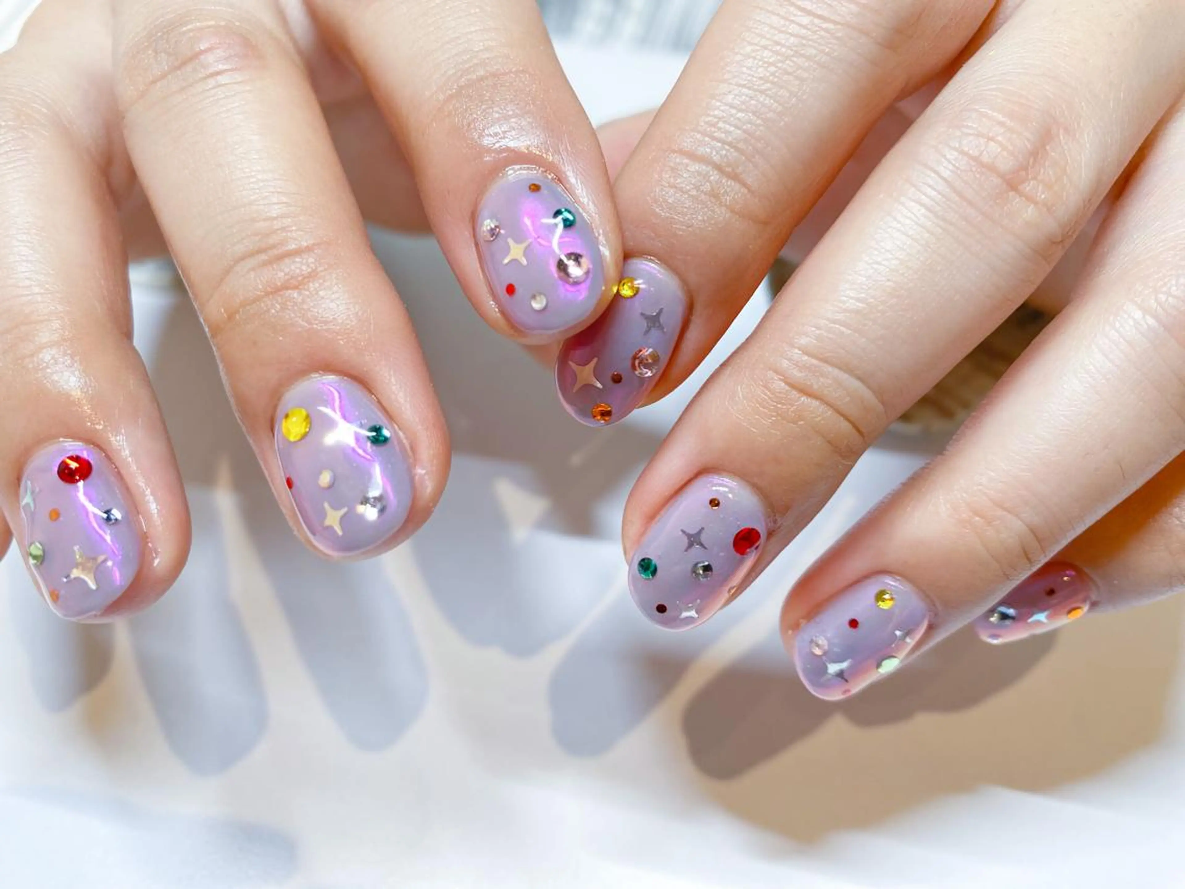 ネイル オーロラネイル キラキラネイル ストーンネイル ハンドネイル 表参道colore店 REICAのネイルデザイン