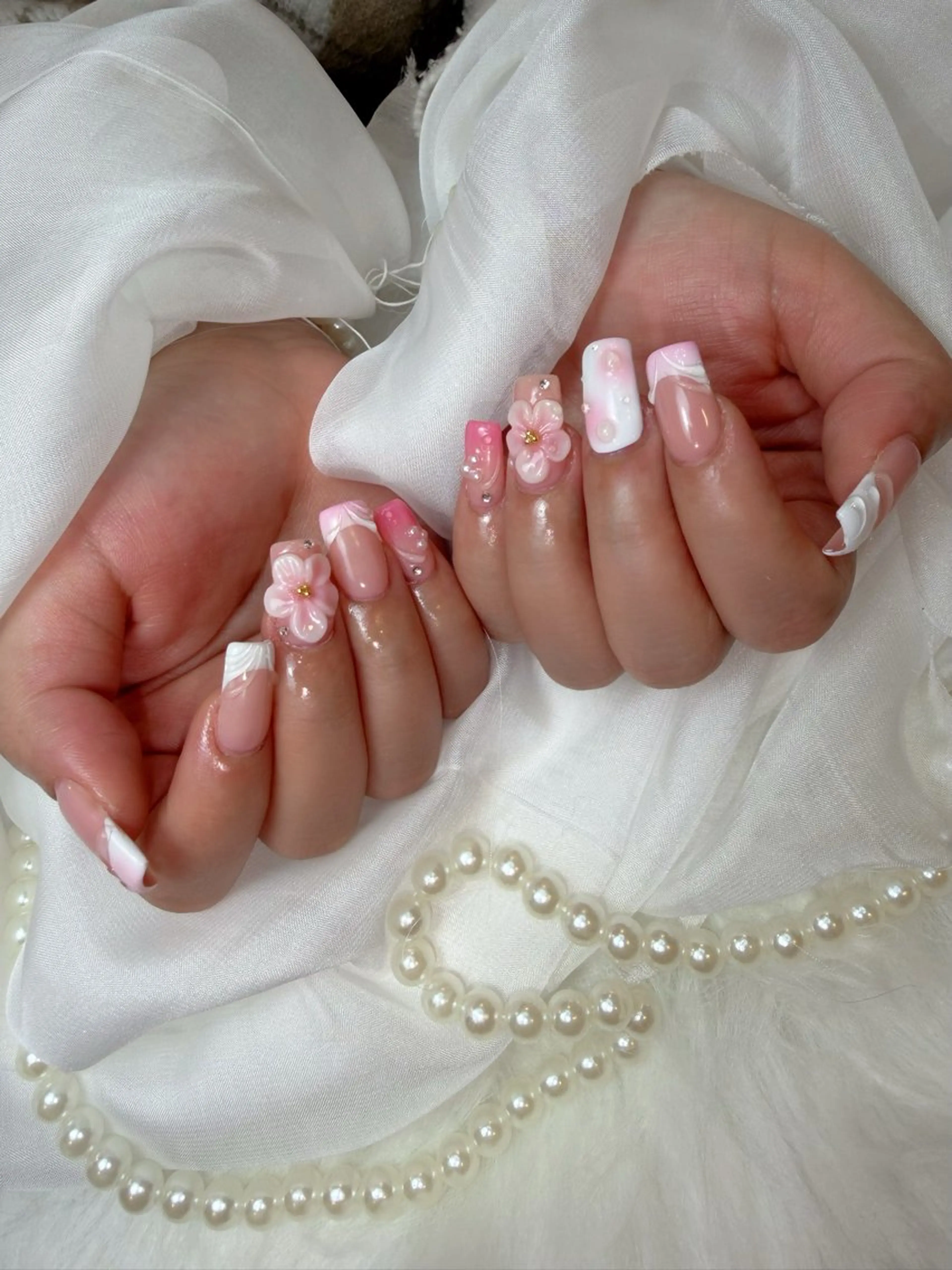 ネイル フレンチネイル キラキラネイル 持ち込み ピンク リボン ハンドネイル FUJI Nail Salon所属・FUJI NAILSALONのネイルデザイン